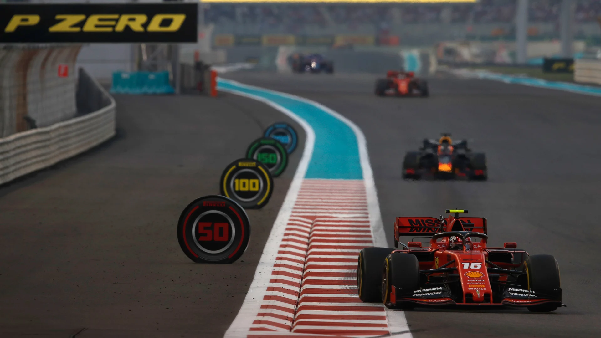 YAS MARINA CIRCUIT, UNITED ARAB EMIRATES - DECEMBER 01: Charles Leclerc, Ferrari SF90, leads Max