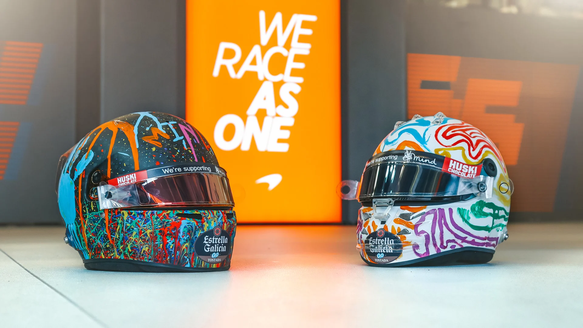 Lando Norris's Mind helmet (L) and Carlos Sainz's Mind helmet (R)