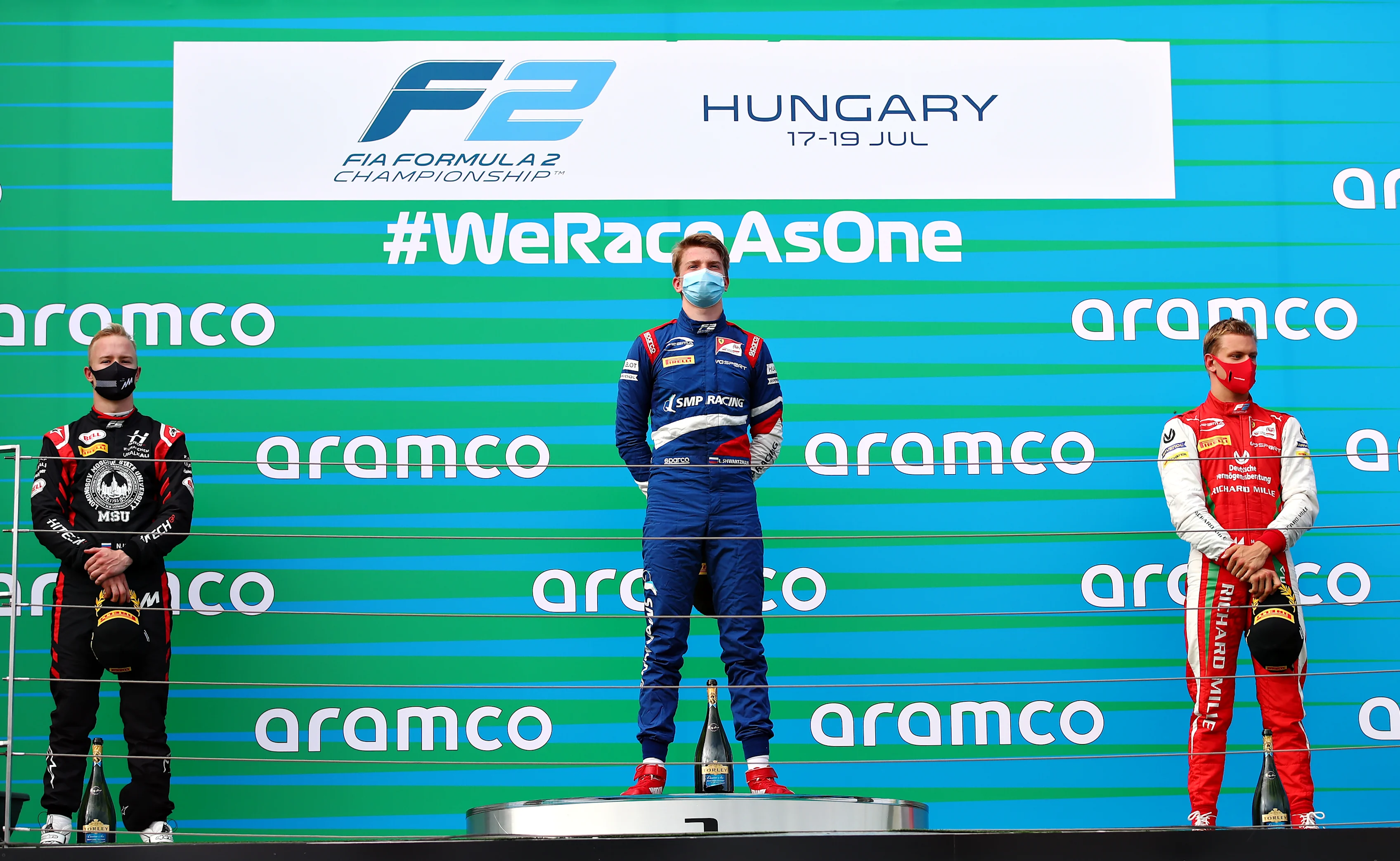 BUDAPEST, HUNGARY - JULY 18: Race winner Robert Shwartzman of Russia and Prema Racing (centre)