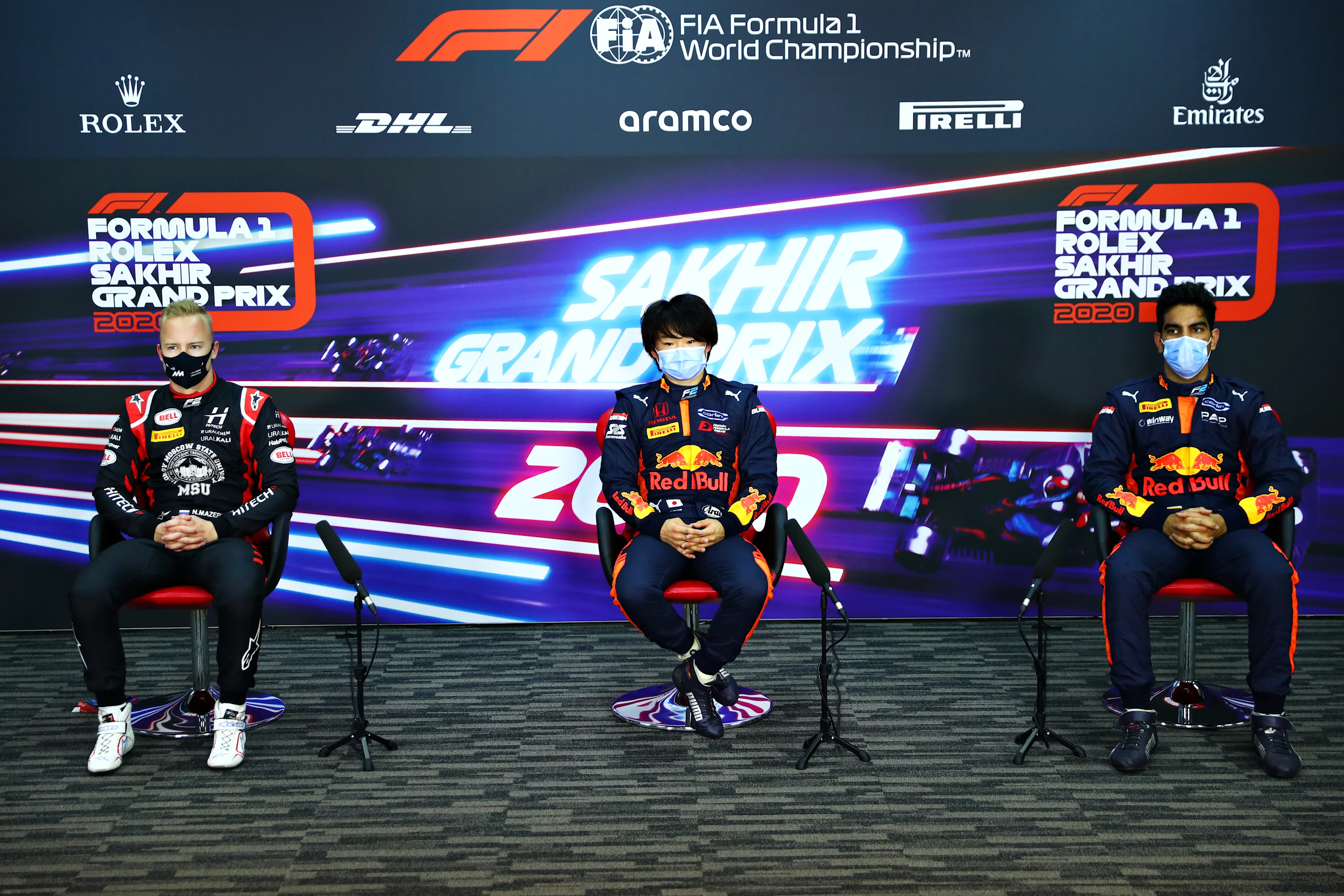 BAHRAIN, BAHRAIN - DECEMBER 04: Pole position qualifier Yuki Tsunoda of Japan and Carlin (centre),