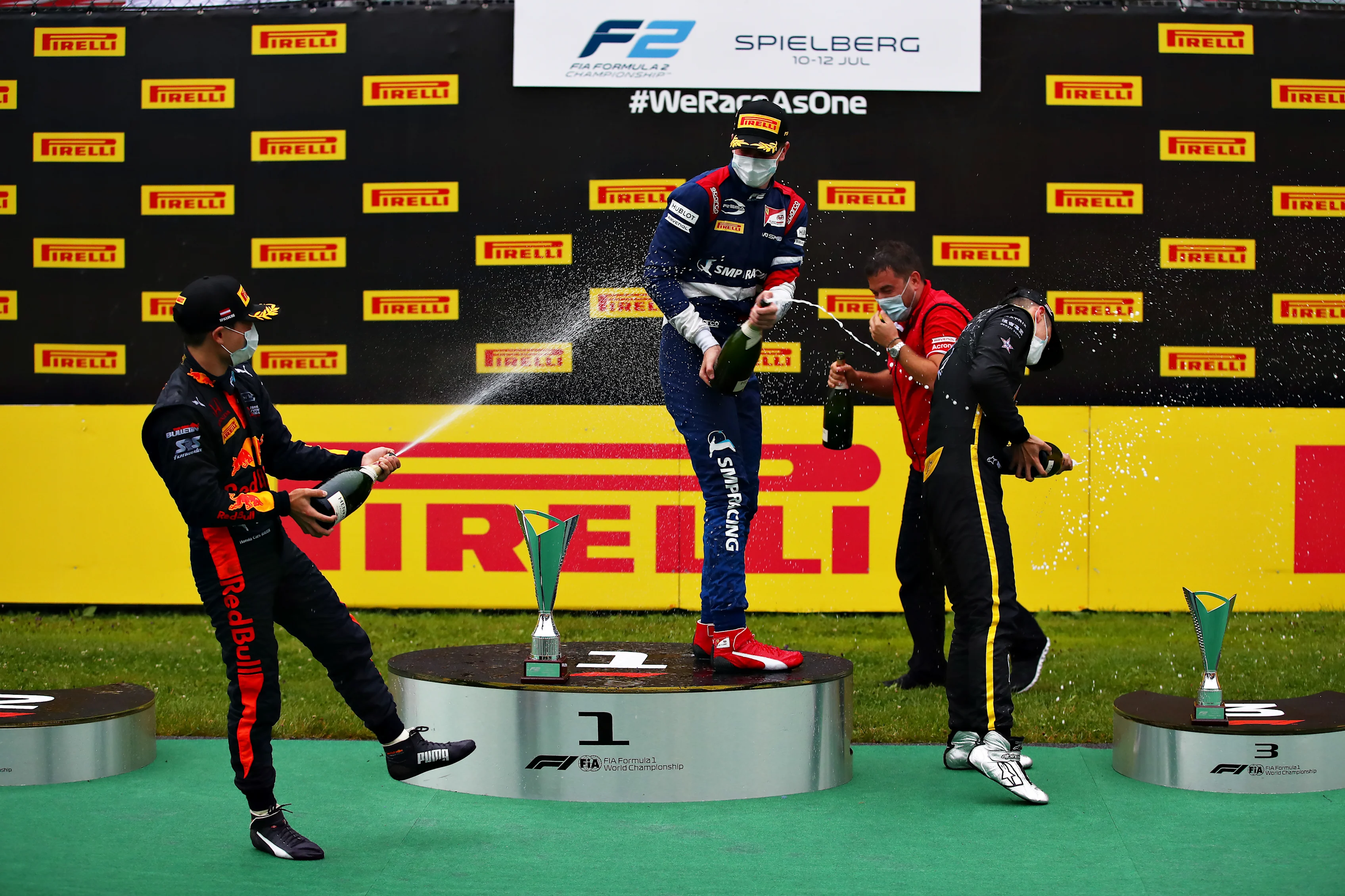 SPIELBERG, AUSTRIA - JULY 11:  Race winner Robert Shwartzman of Russia and Prema Racing (centre)