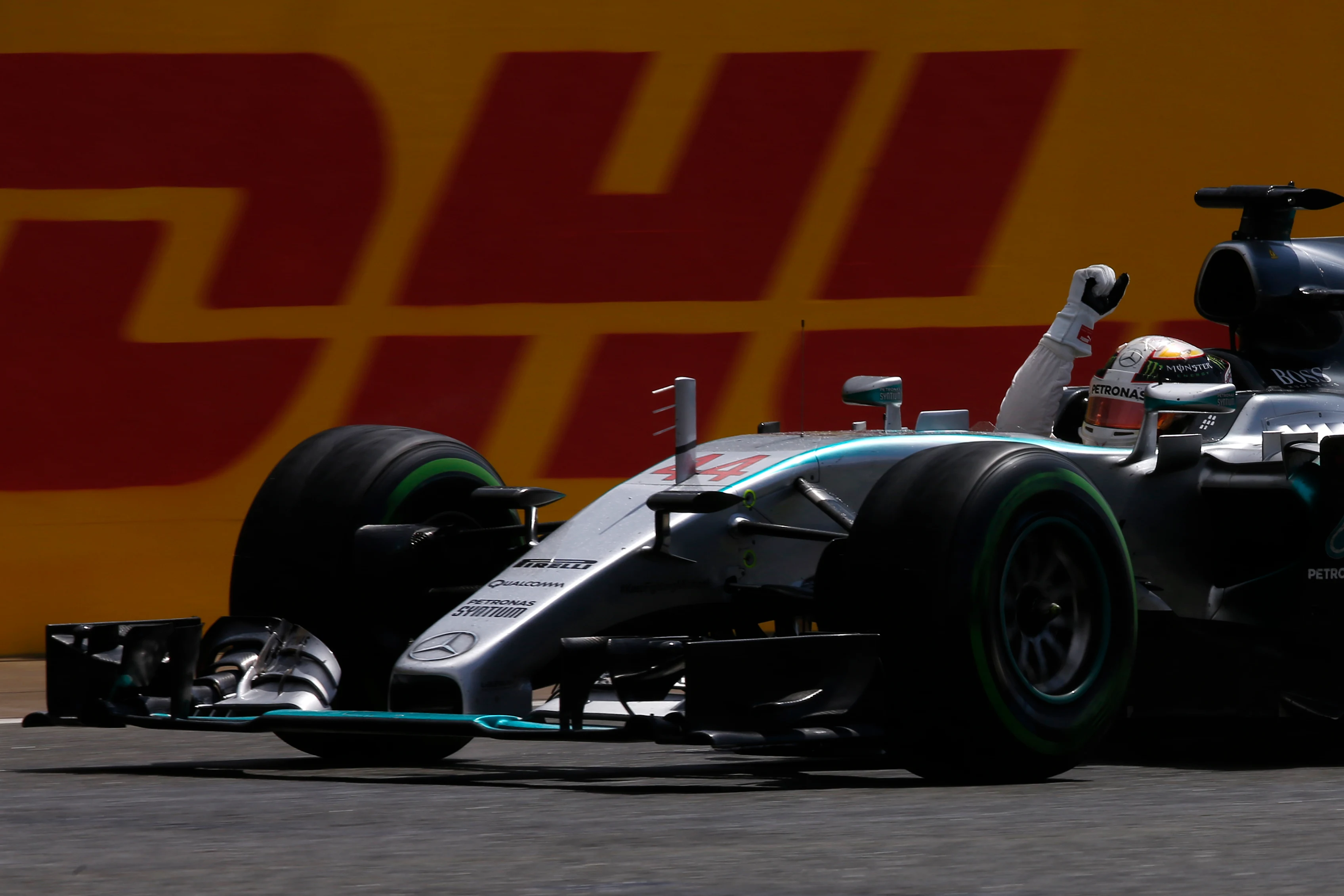 NORTHAMPTON, ENGLAND - JULY 05: Lewis Hamilton of Great Britain and Mercedes GP celebrates victory