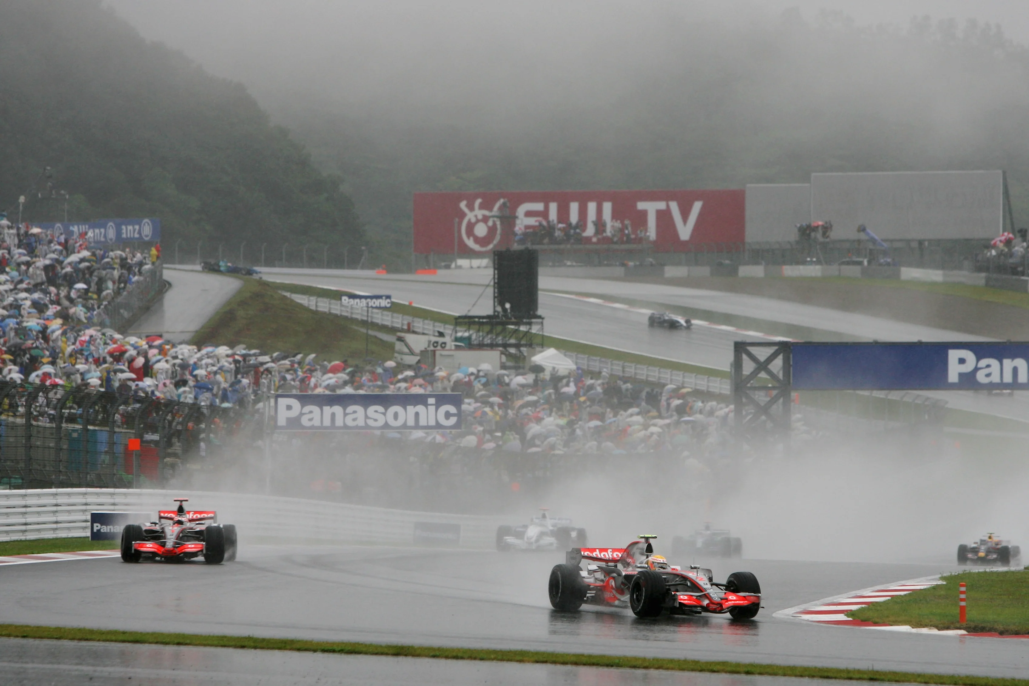 SHIZUOKA, JAPAN - SEPTEMBER 30: Lewis Hamilton (front) of Great Britain and McLaren Mercedes and