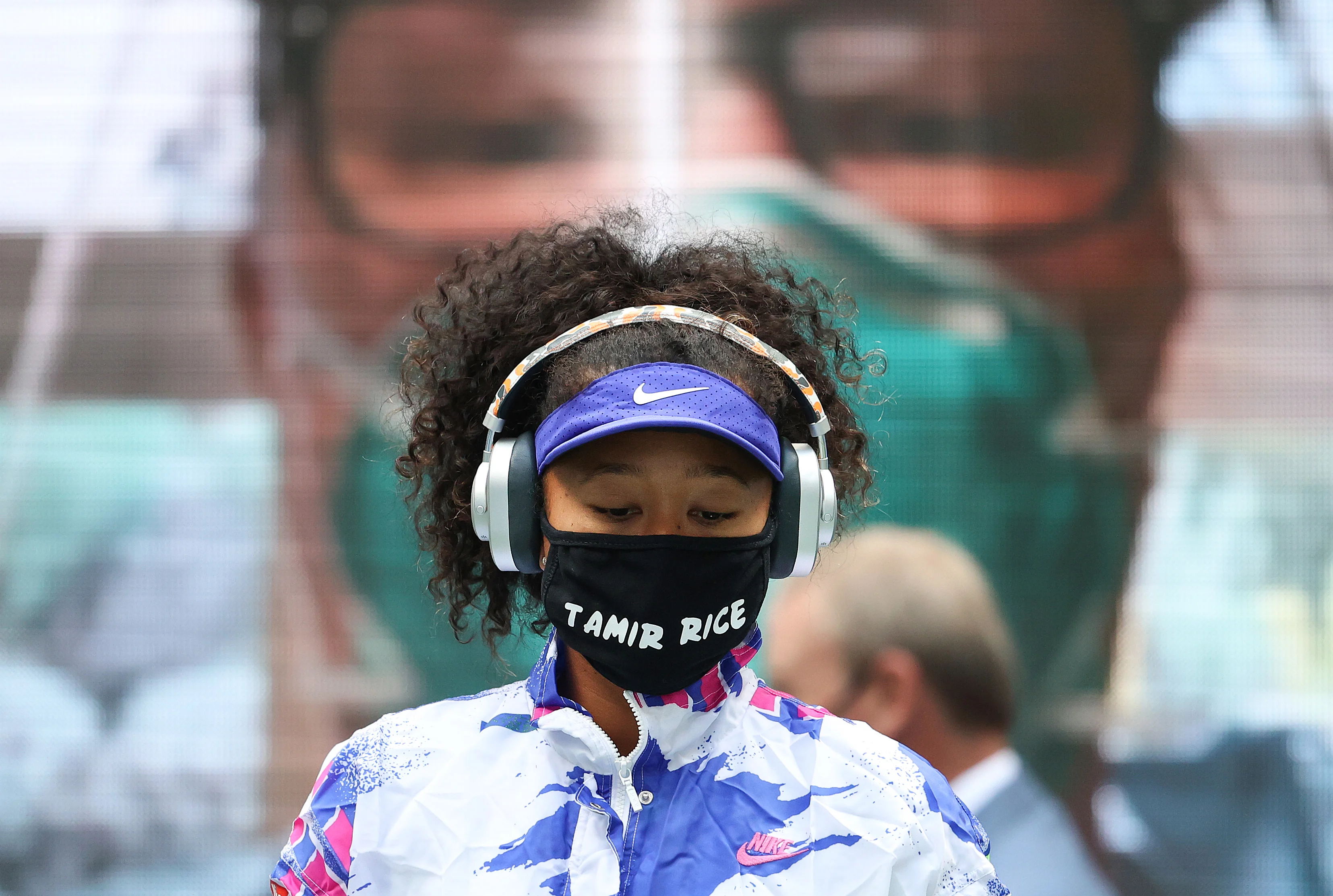 NEW YORK, NEW YORK - SEPTEMBER 12: Naomi Osaka of Japan walks on court in front of virtual fans