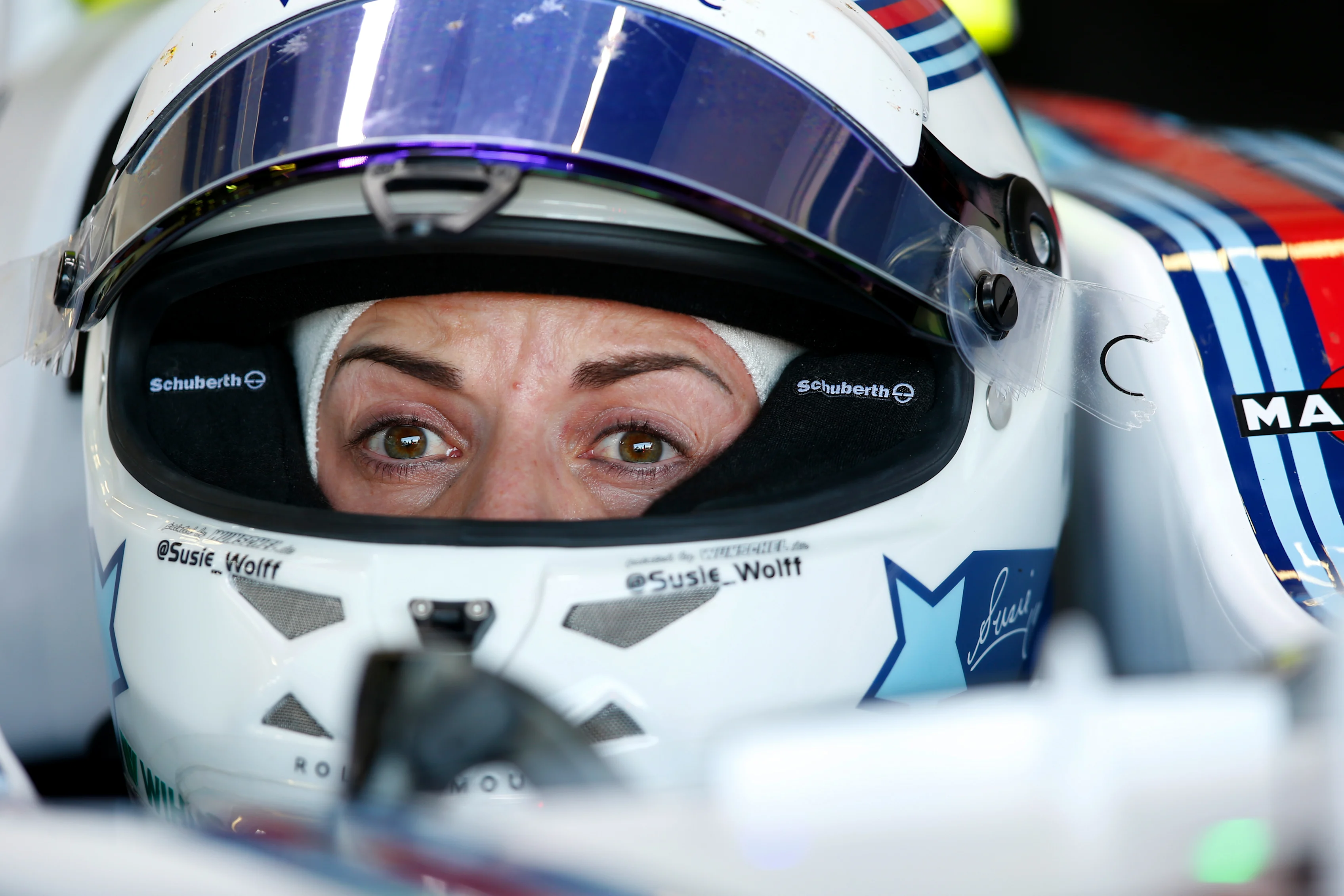 NORTHAMPTON, ENGLAND - JULY 03: Susie Wolff of Great Britain and Williams sits in her car in the