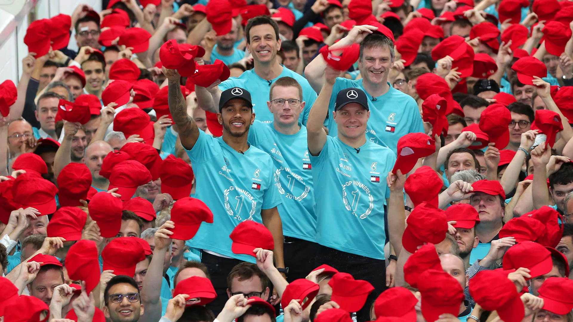 The team celebrate the fifth consecutive Drivers' and Constructors' Championship at the end of the