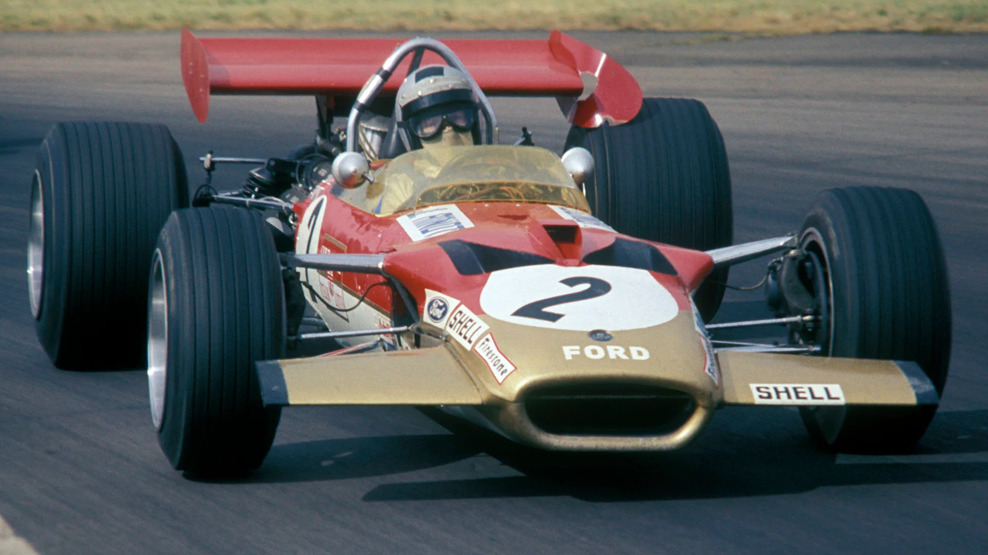 Jochen Rindt of Austria drives the #2 Gold Leaf Team Lotus Lotus 49B Ford V8 with a damaged left