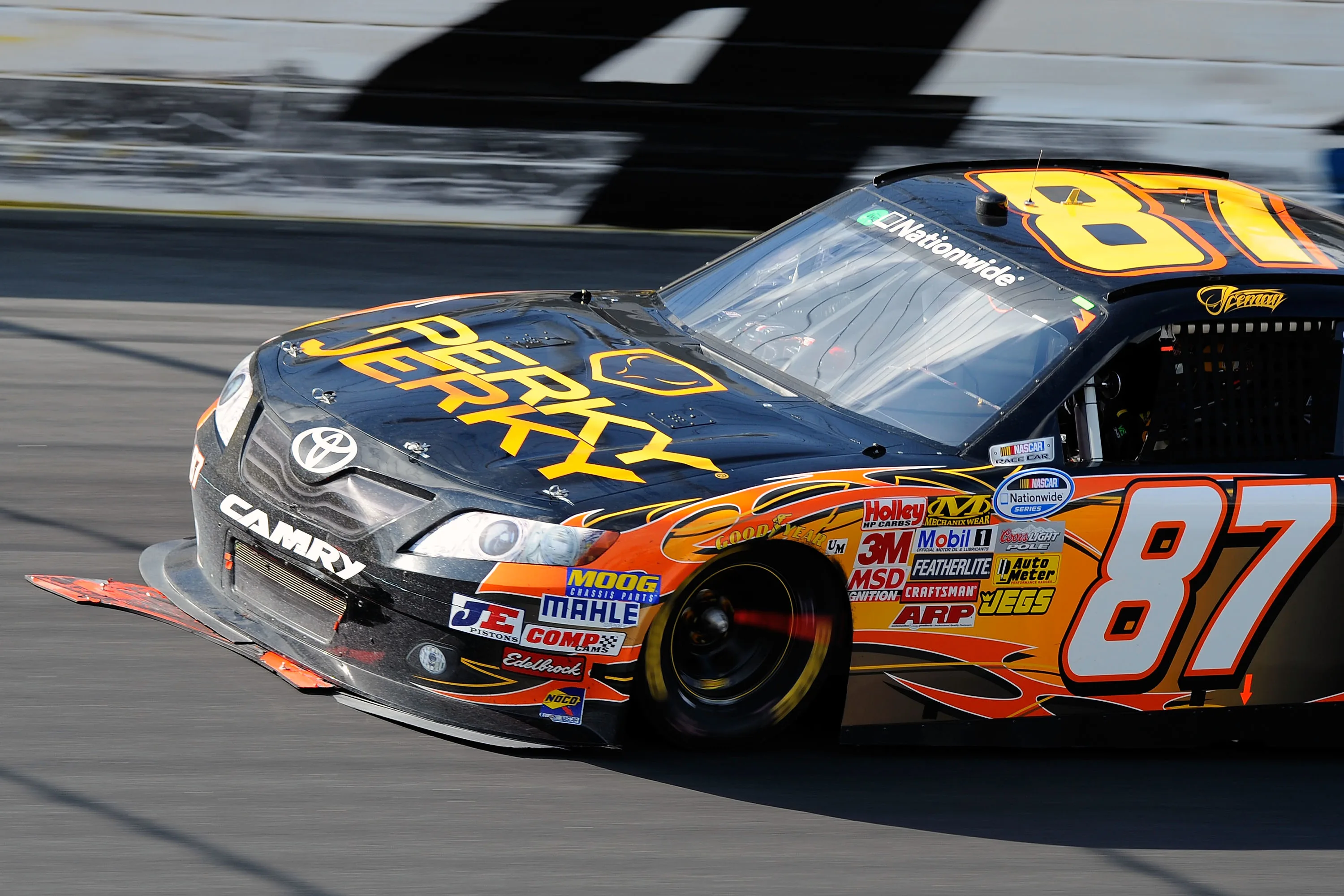 CHARLOTTE, NC - MAY 28:  Kimi Raikkonen drives the #87 Perky Jerky Toyota with a damaged splitter