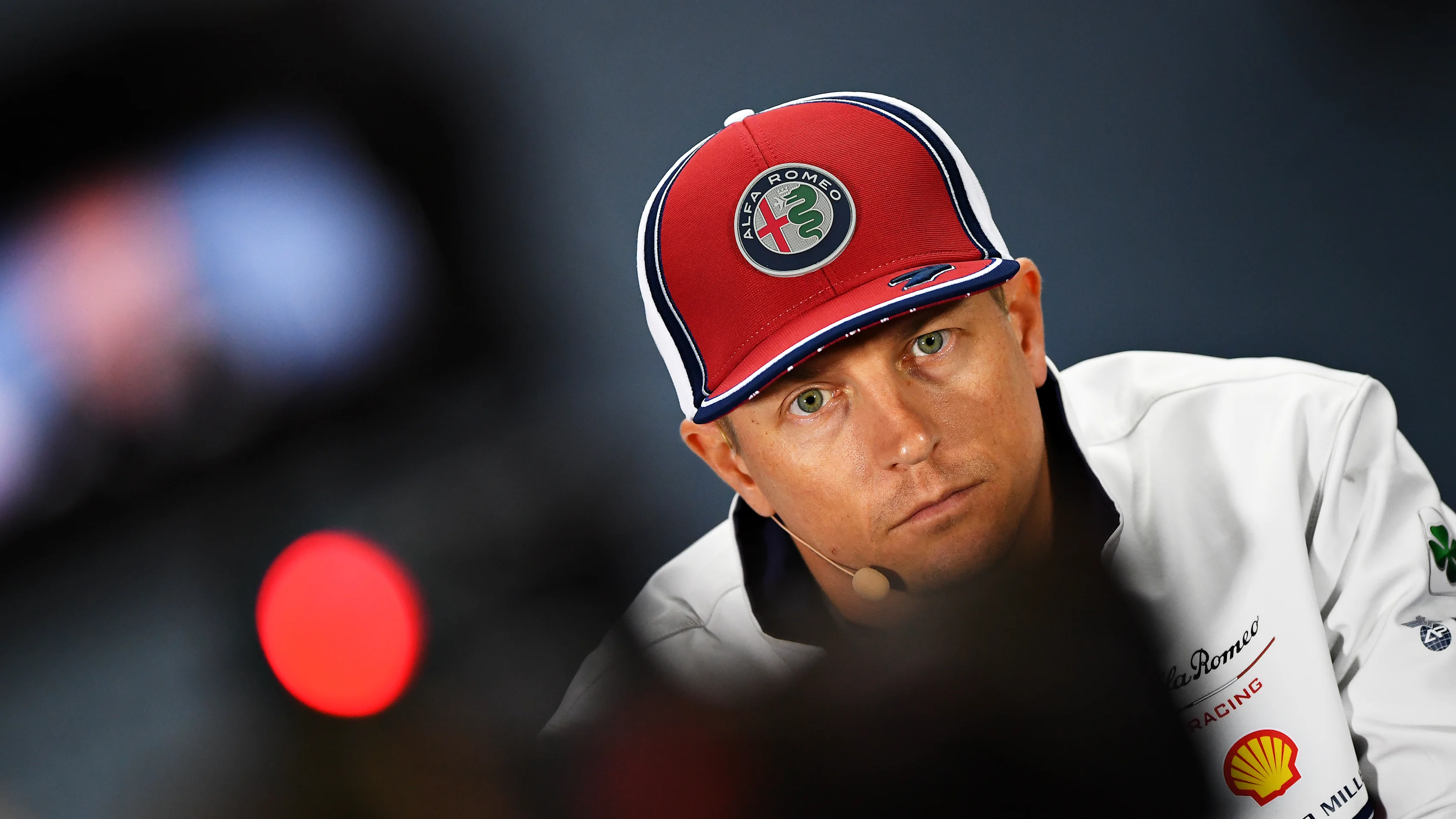 SOCHI, RUSSIA - SEPTEMBER 26: Kimi Raikkonen of Finland and Alfa Romeo Racing talks in the Drivers