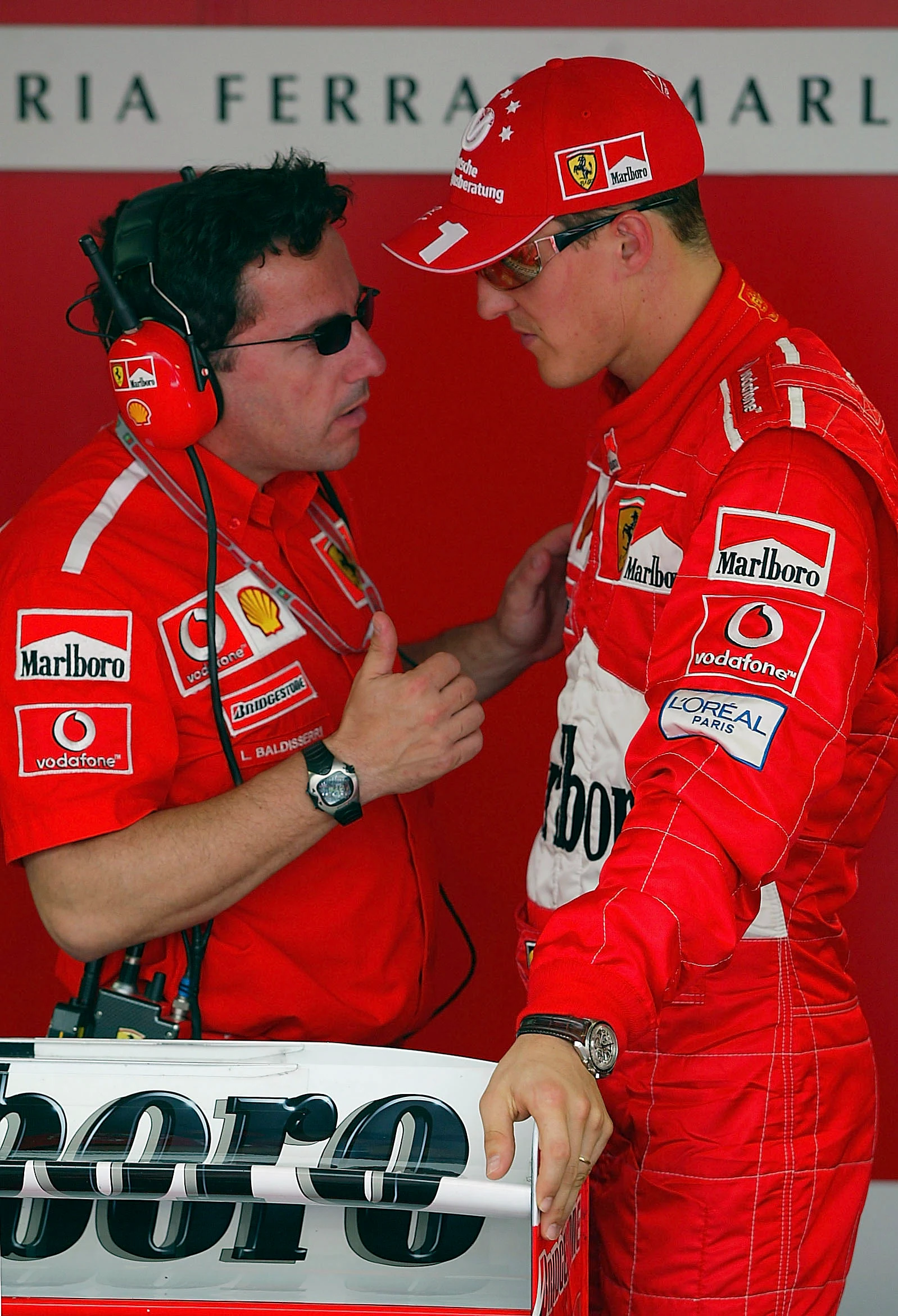MONACO - MAY 31:  Michael Schumacher of Germany and Ferrari chats to race engineer Luca Baldisserri