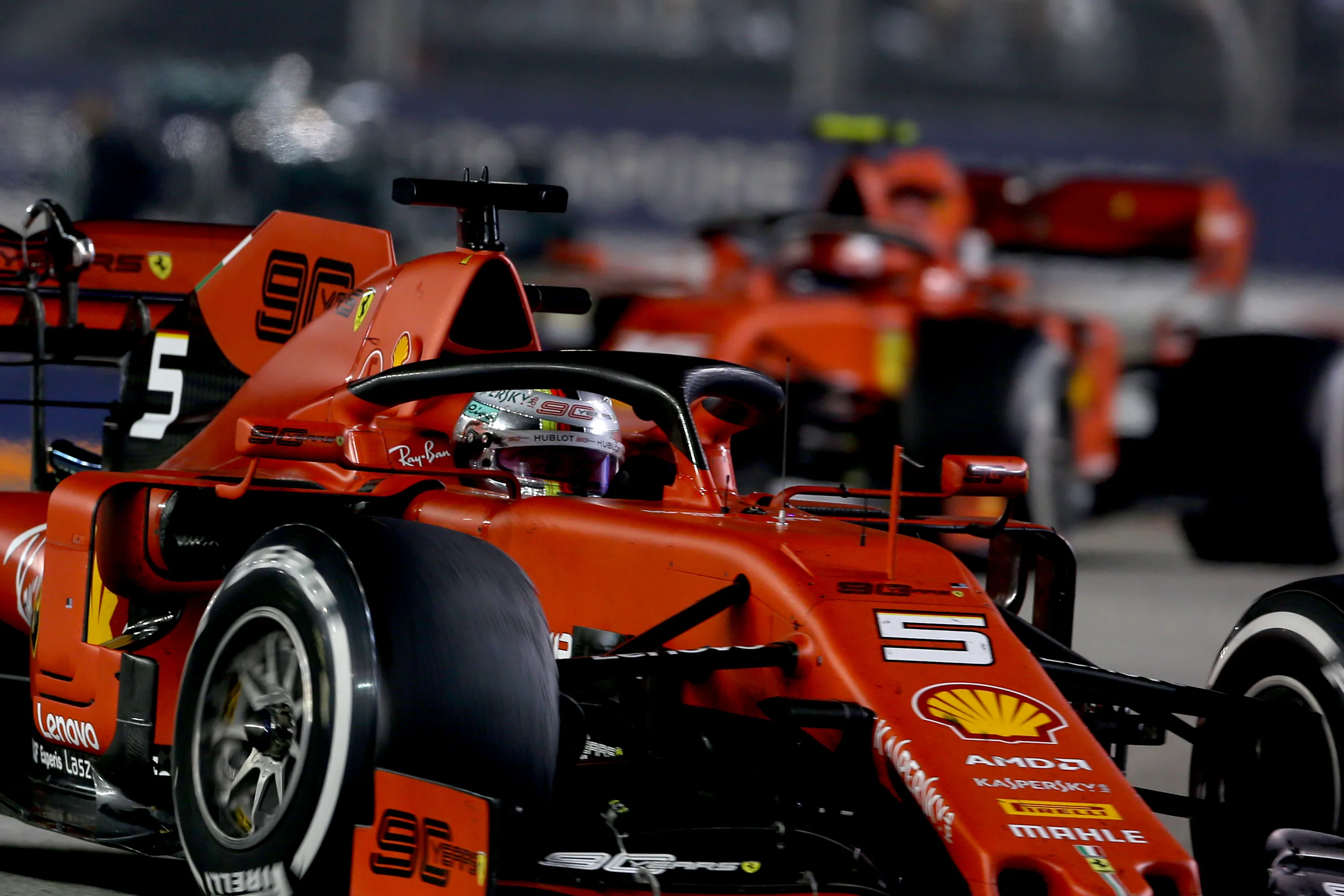 SINGAPORE, SINGAPORE - SEPTEMBER 22: Sebastian Vettel of Germany driving the (5) Scuderia Ferrari
