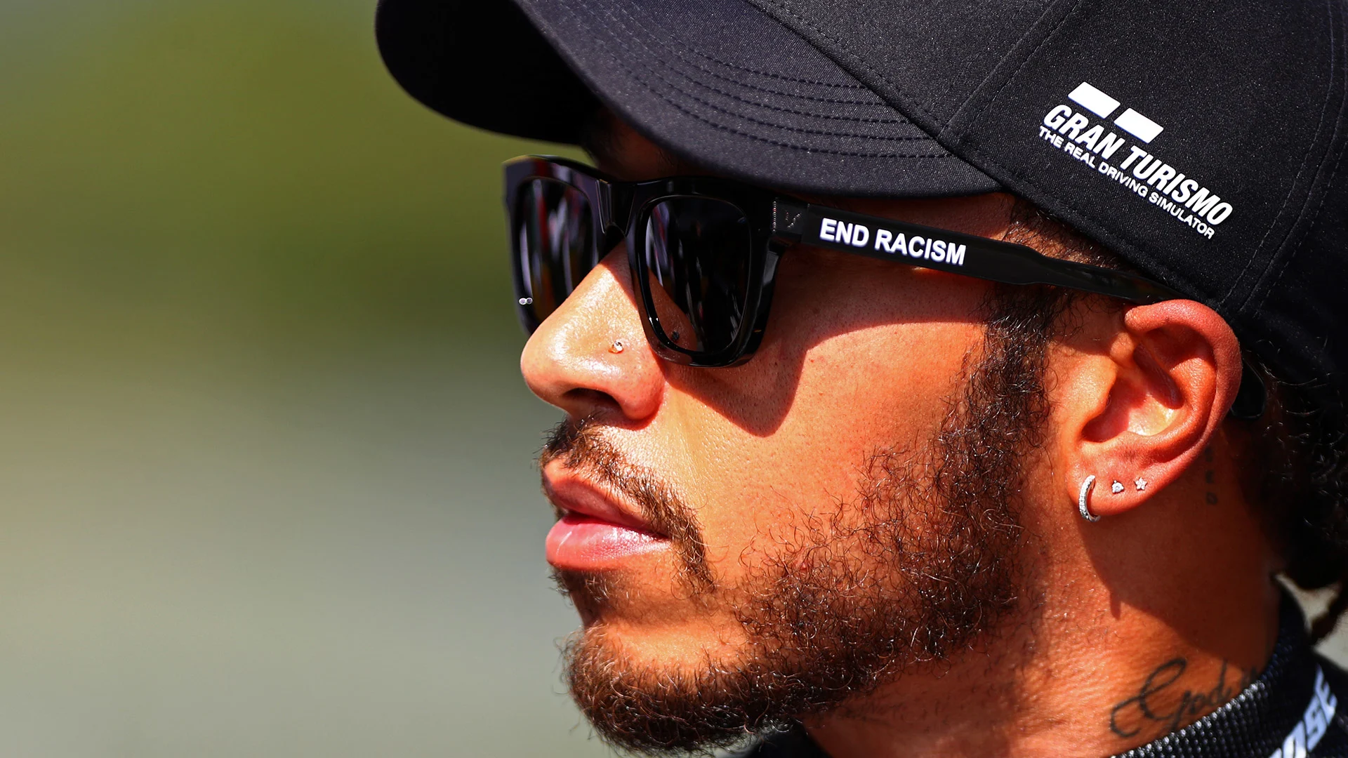 SCARPERIA, ITALY - SEPTEMBER 13: Lewis Hamilton of Great Britain and Mercedes GP wears a t-shirt