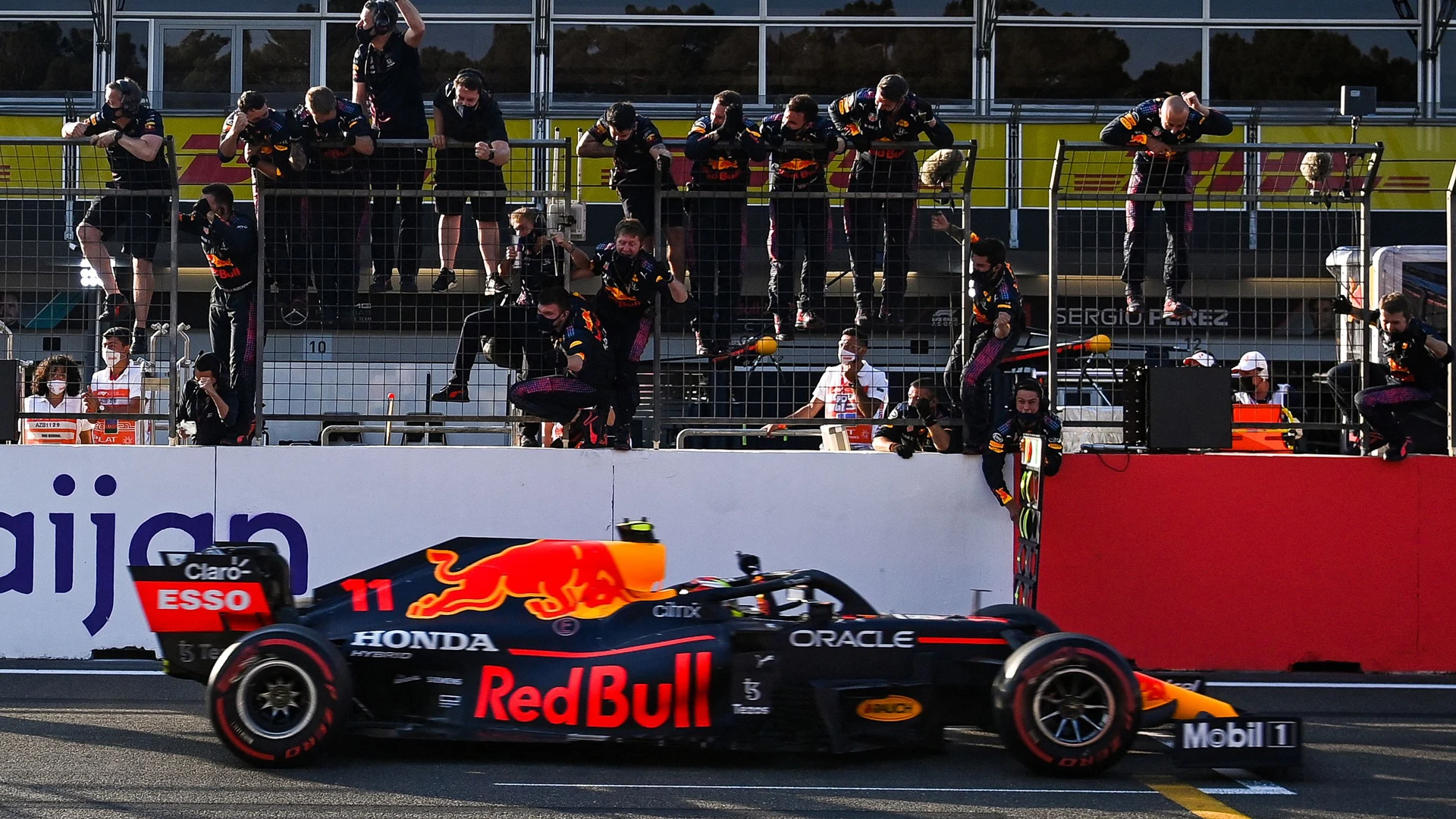 TOPSHOT - Red Bull's Mexican driver Sergio Perez wins the Formula One Azerbaijan Grand Prix at the
