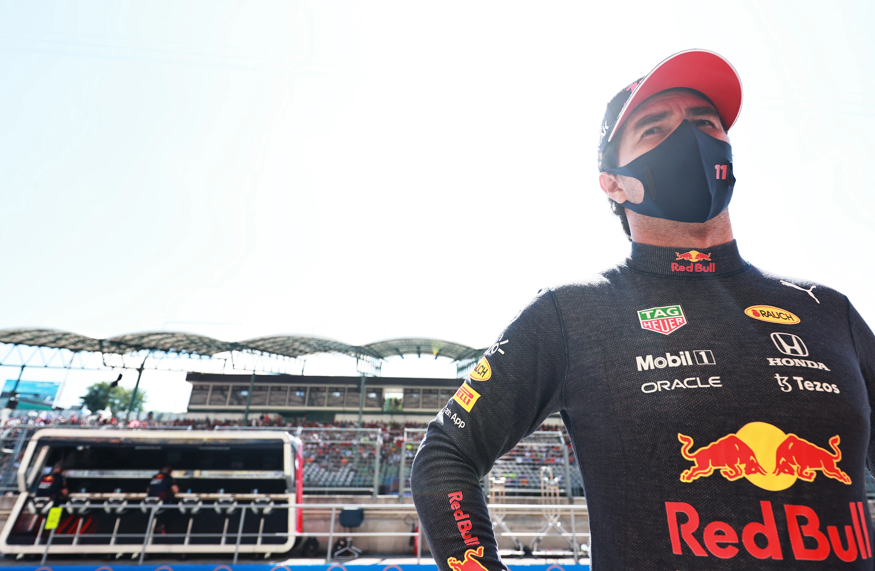 BUDAPEST, HUNGARY - JULY 31: Sergio Perez of Mexico and Red Bull Racing looks on in the Pitlane