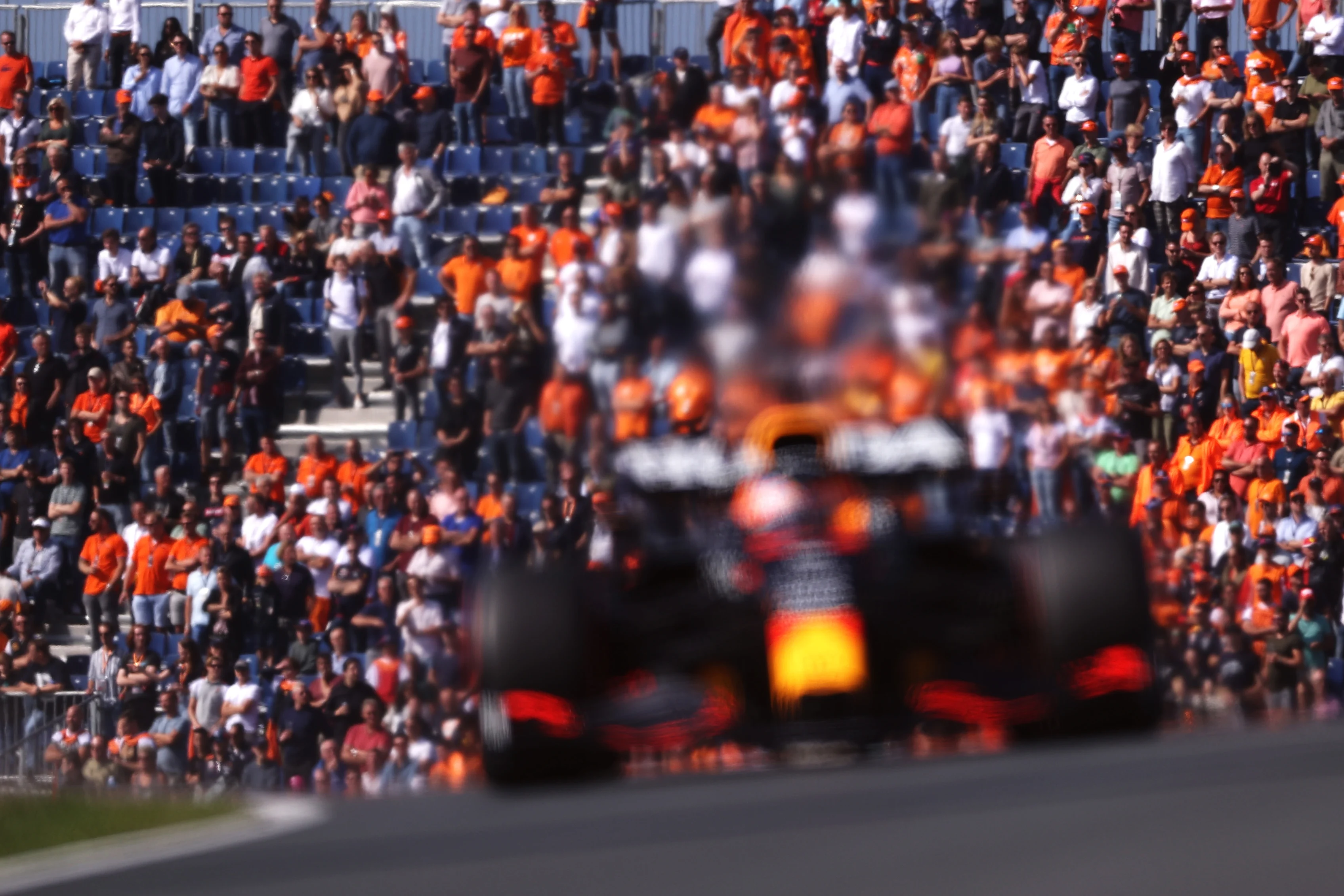 ZANDVOORT, NETHERLANDS - SEPTEMBER 03: Fans watch as Max Verstappen of the Netherlands driving the