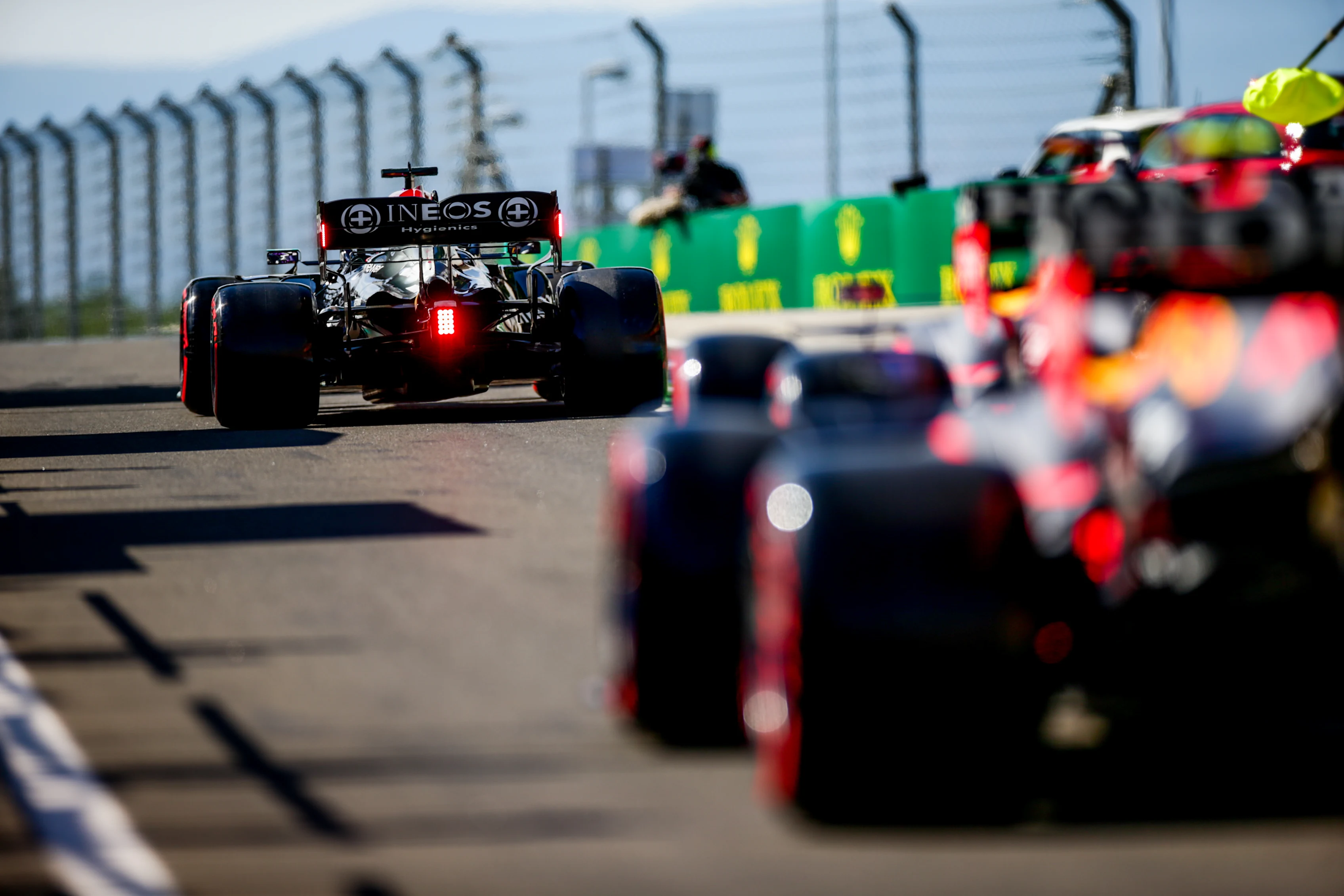 BUDAPEST, HUNGARY - JULY 31: Lewis Hamilton of Mercedes and Great Britain leads Max Verstappen of