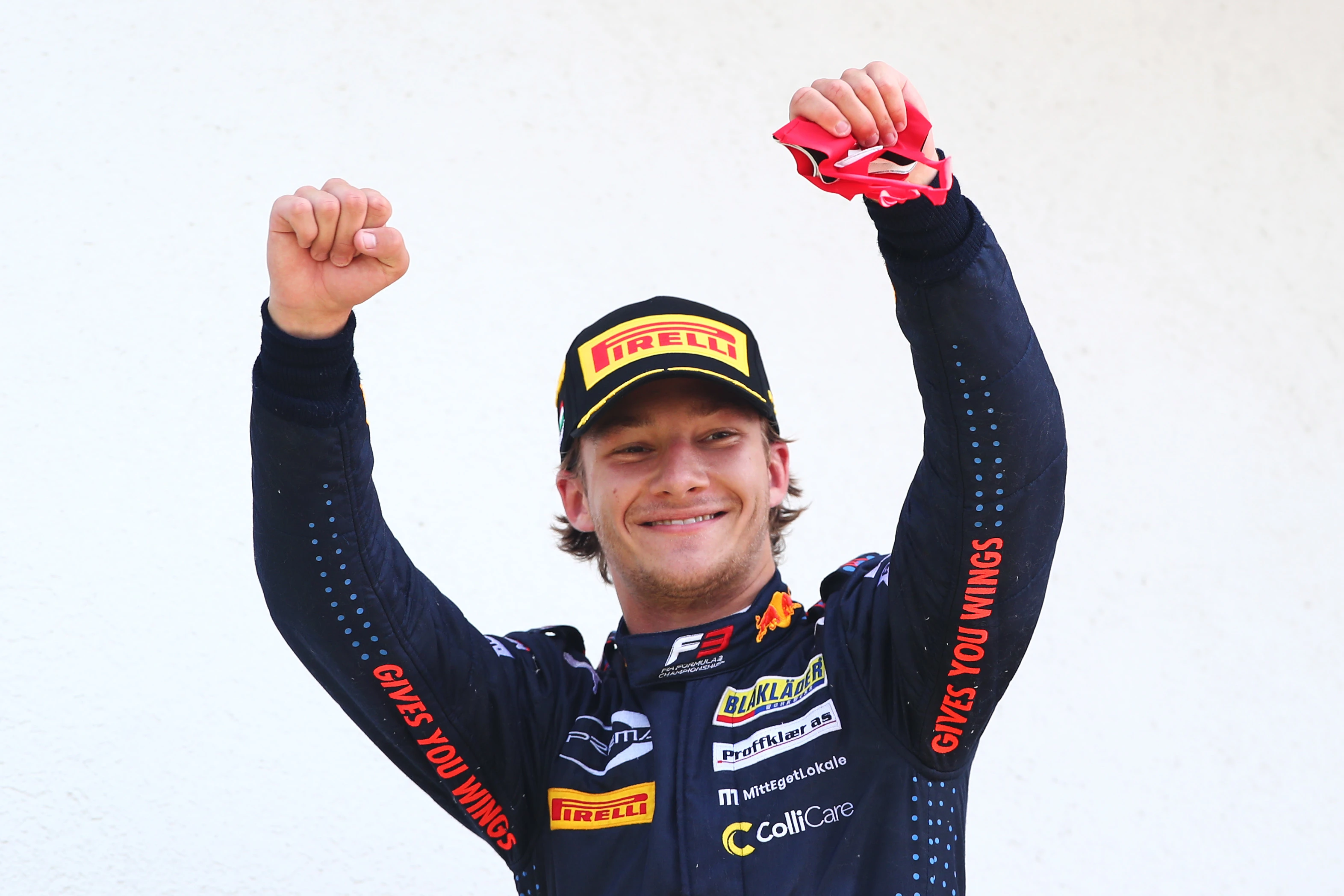 BUDAPEST, HUNGARY - AUGUST 01: Race winner Dennis Hauger of Norway and Prema Racing celebrates on