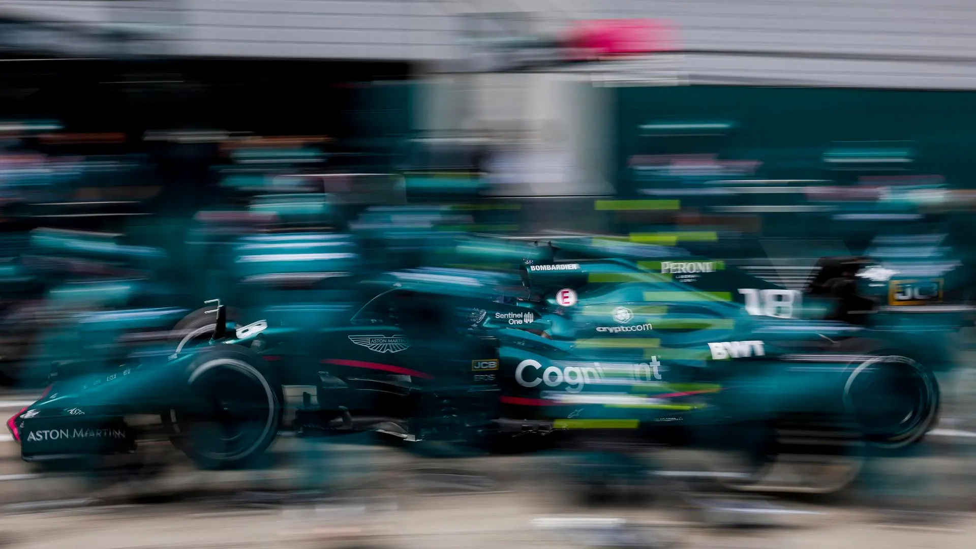 Lance Stroll, Aston Martin AMR21, makes a pit