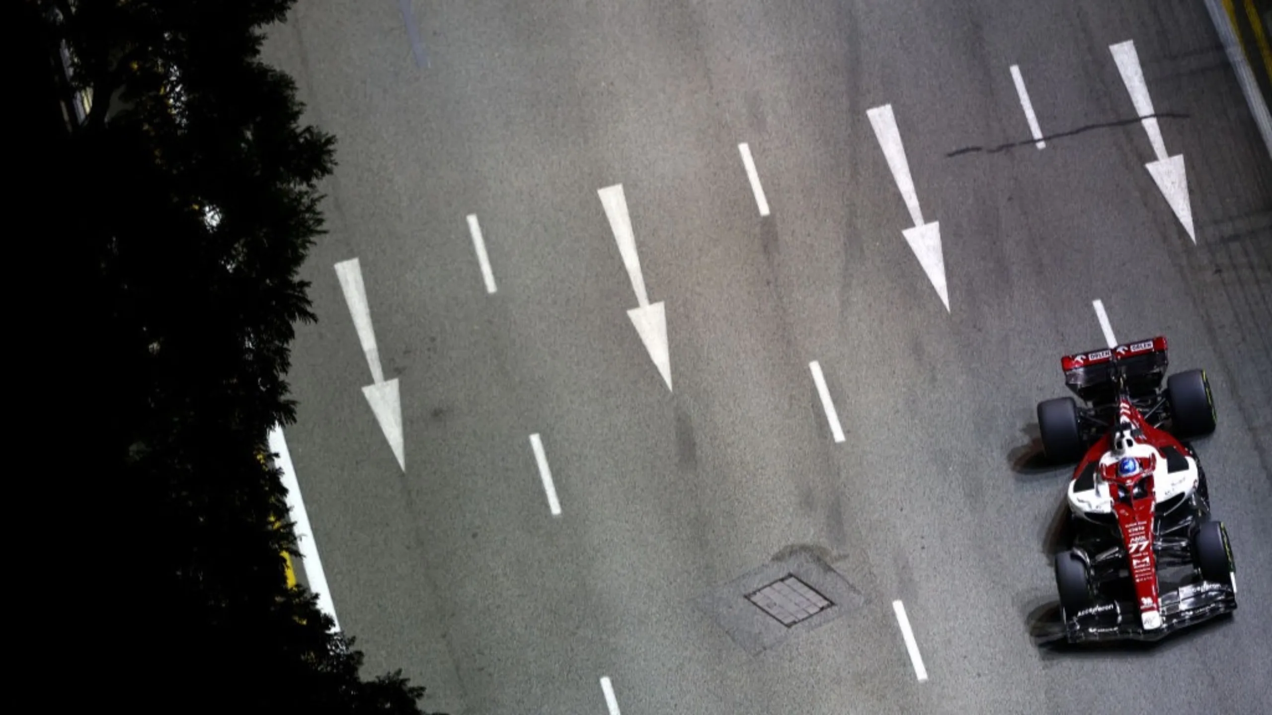 SINGAPORE, SINGAPORE - SEPTEMBER 30: Valtteri Bottas of Finland driving the (77) Alfa Romeo F1 C42
