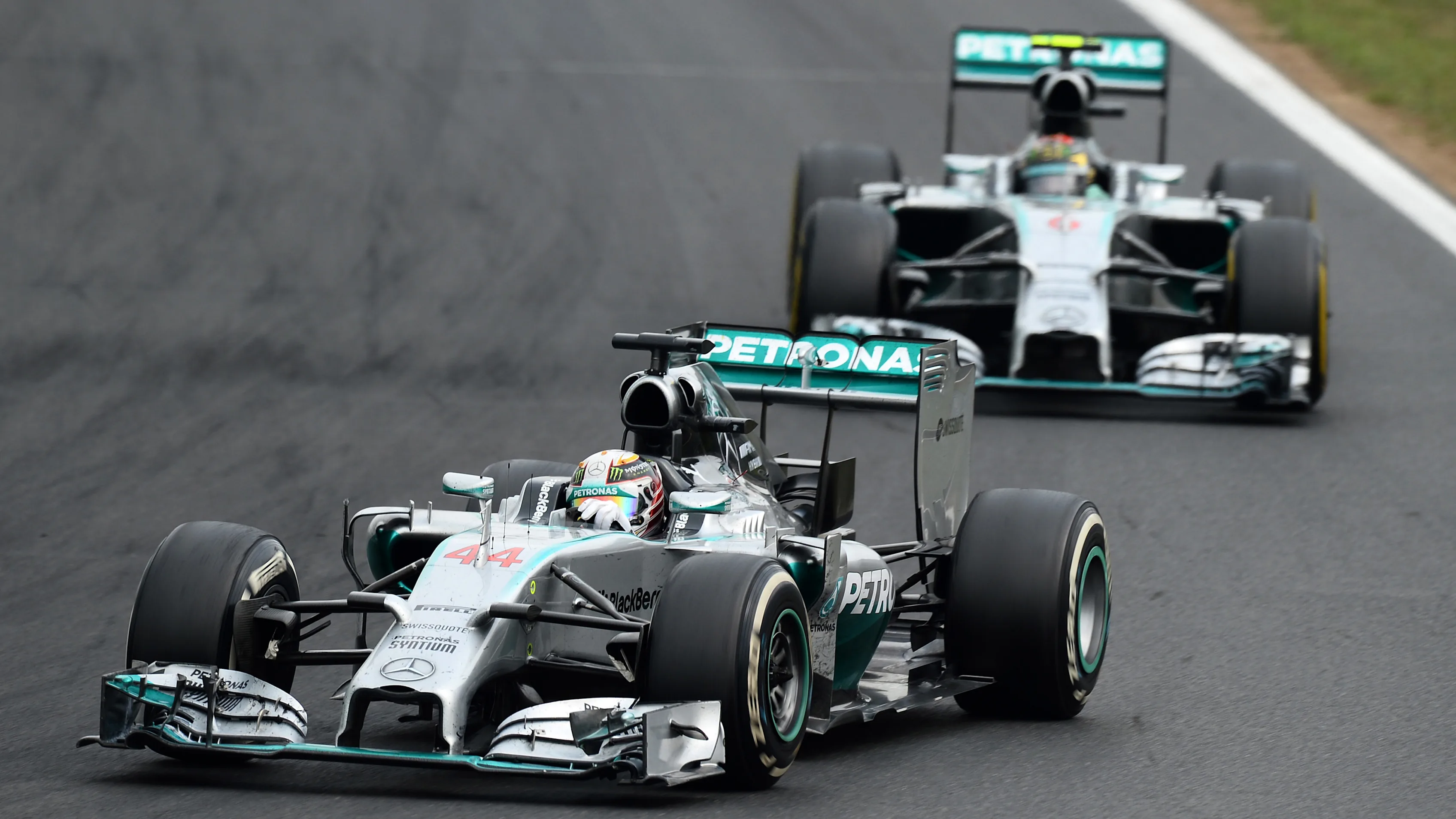 Lewis Hamilton (GBR) Mercedes AMG F1 W05 leads Nico Rosberg (GER) Mercedes AMG F1 W05. Formula One World Championship, Rd11, Hungarian Grand Prix, Race Day, Hungaroring, Hungary. Sunday 27 July 2014. © Sutton Motorsport Images