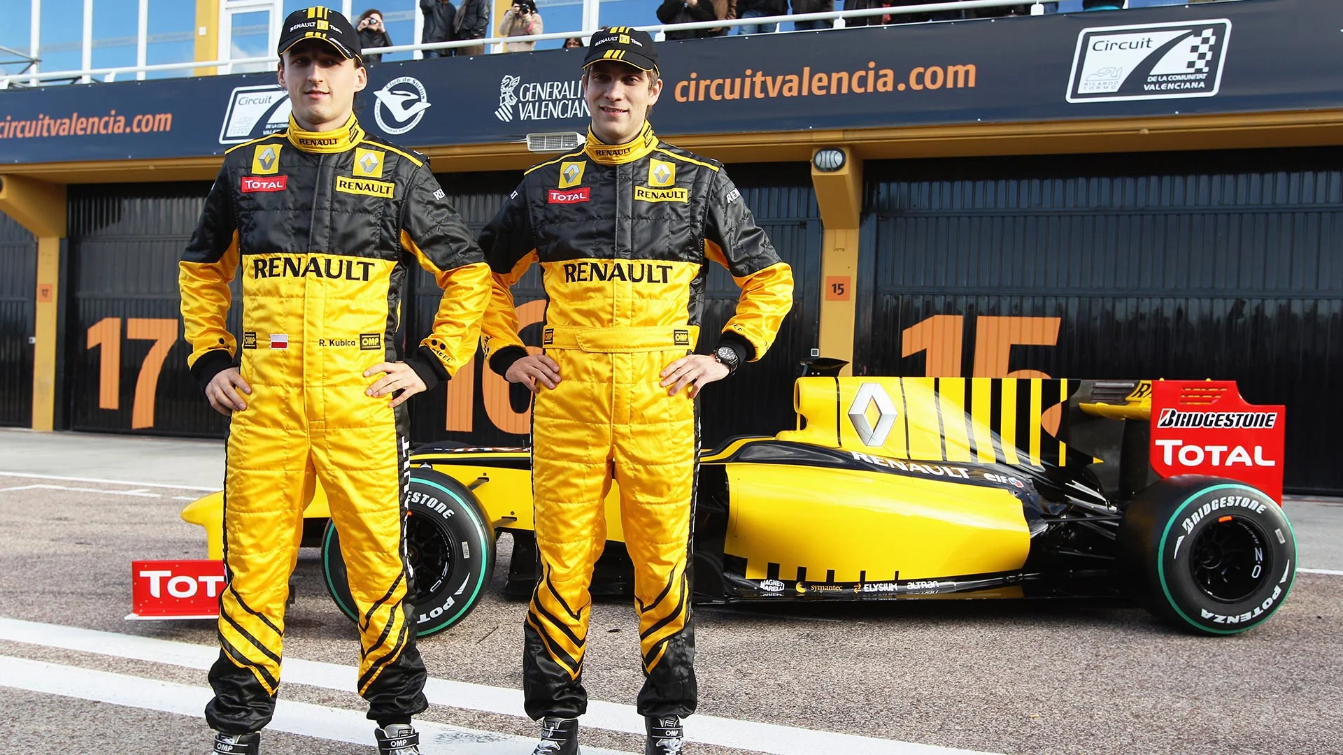 VALENCIA, SPAIN - JANUARY 31: Robert Kubica (L) of Poland and Vitaly Petrov (R) of Russia attend
