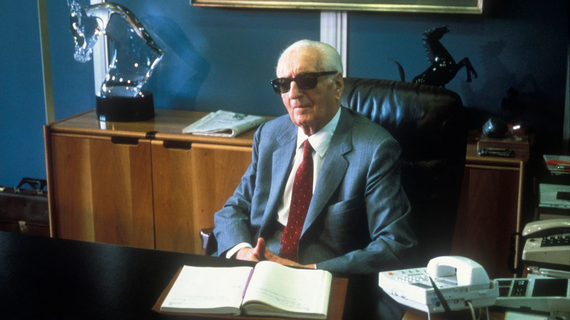 Enzo Ferrari  the founder of the Scuderia Ferrari Grand Prix motor racing team sits at his office