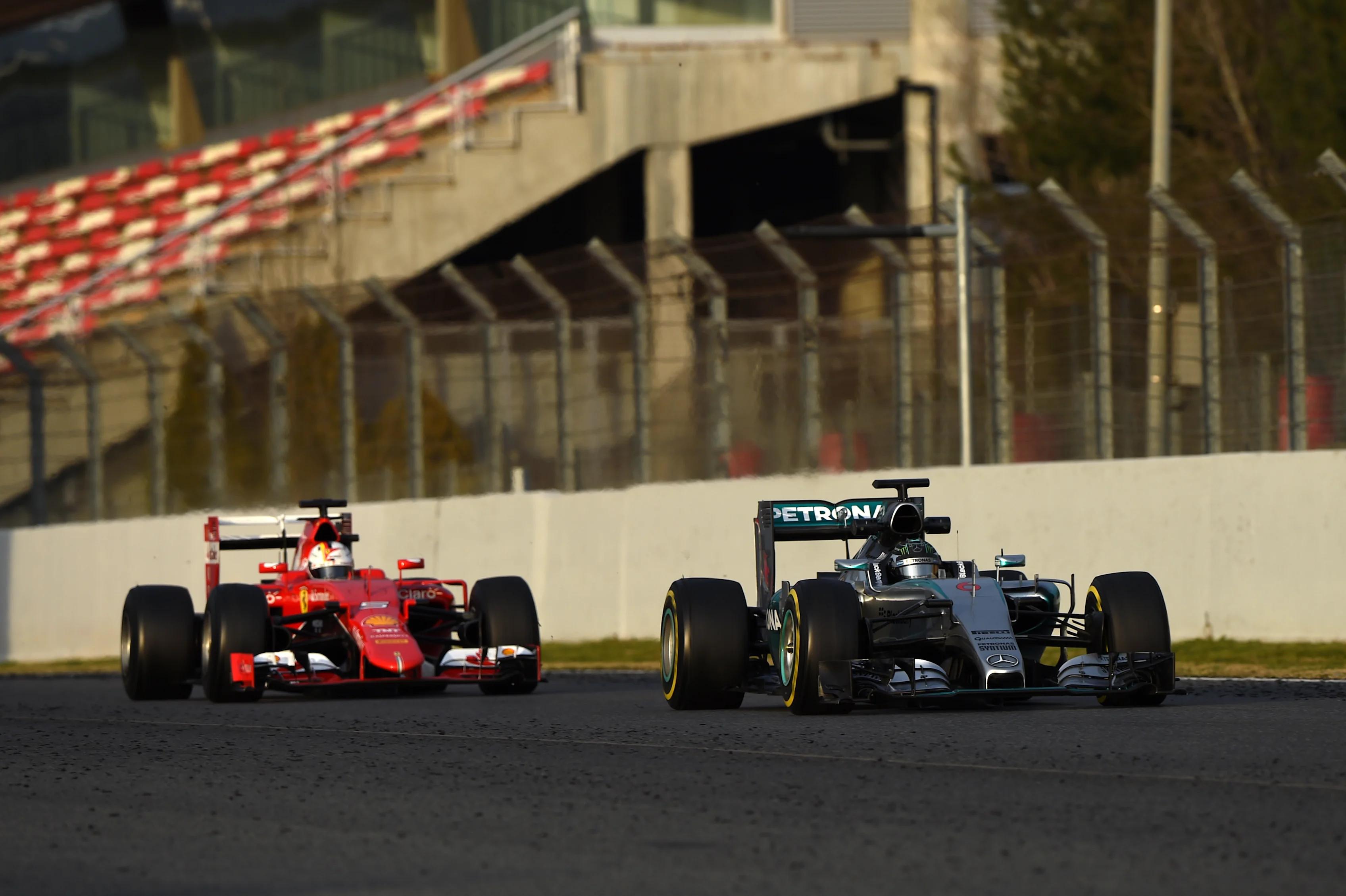 Nico Rosberg (GER) Mercedes AMG F1 W06 and Sebastian Vettel (GER) Ferrari SF15-T at Formula One Testing, Day Four, Barcelona, Spain, 1 March 2015.
