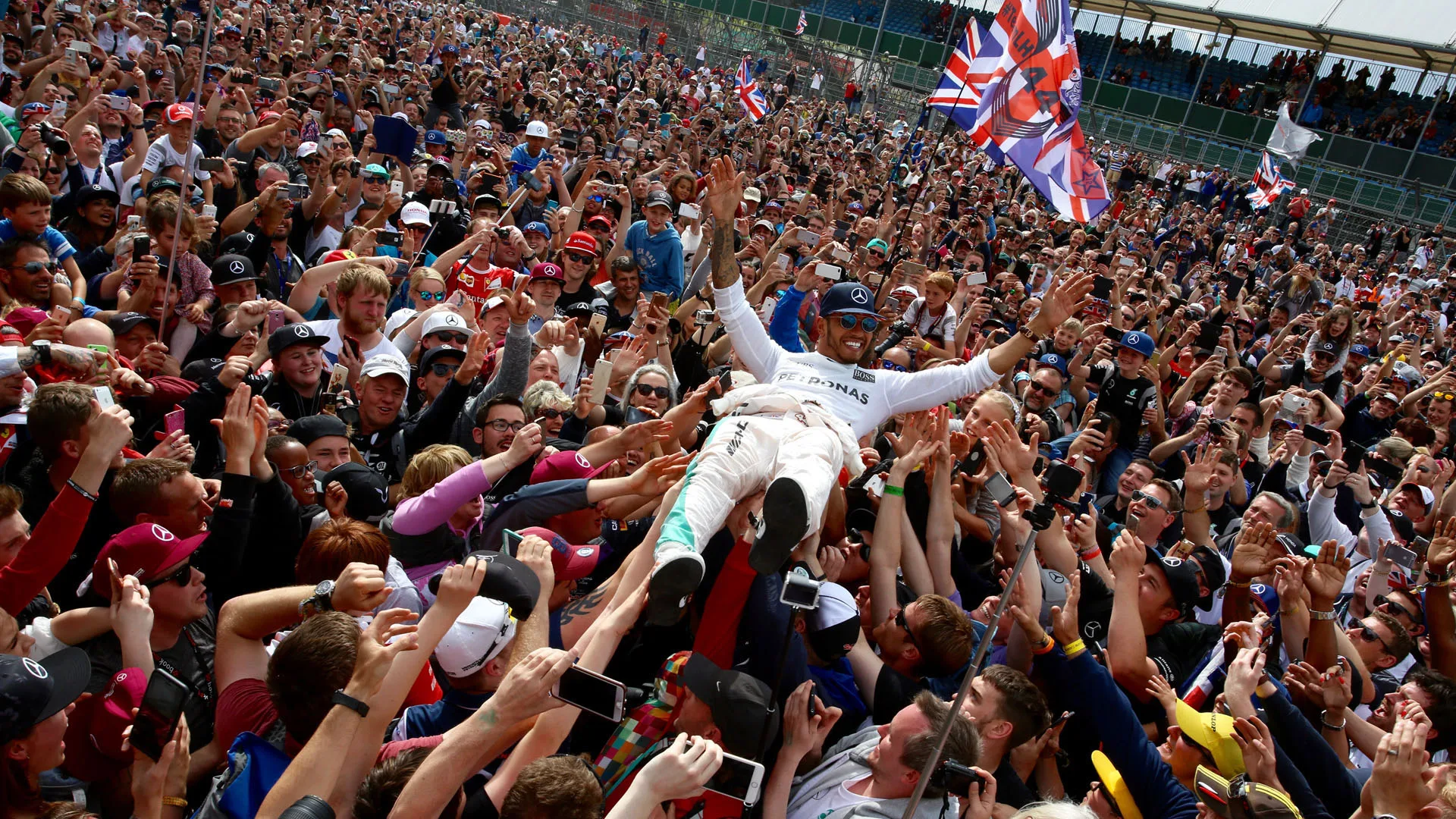 www.sutton-images.com  Race winner Lewis Hamilton (GBR) Mercedes AMG F1 celebrates with the fans