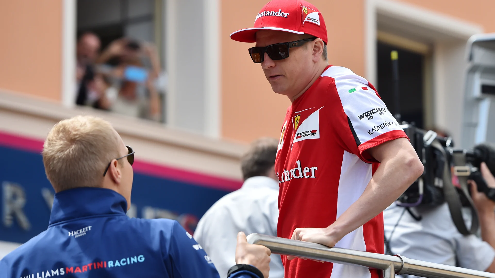Valtteri Bottas (FIN) Williams and Kimi Raikkonen (FIN) Ferrari on the drivers parade at Formula