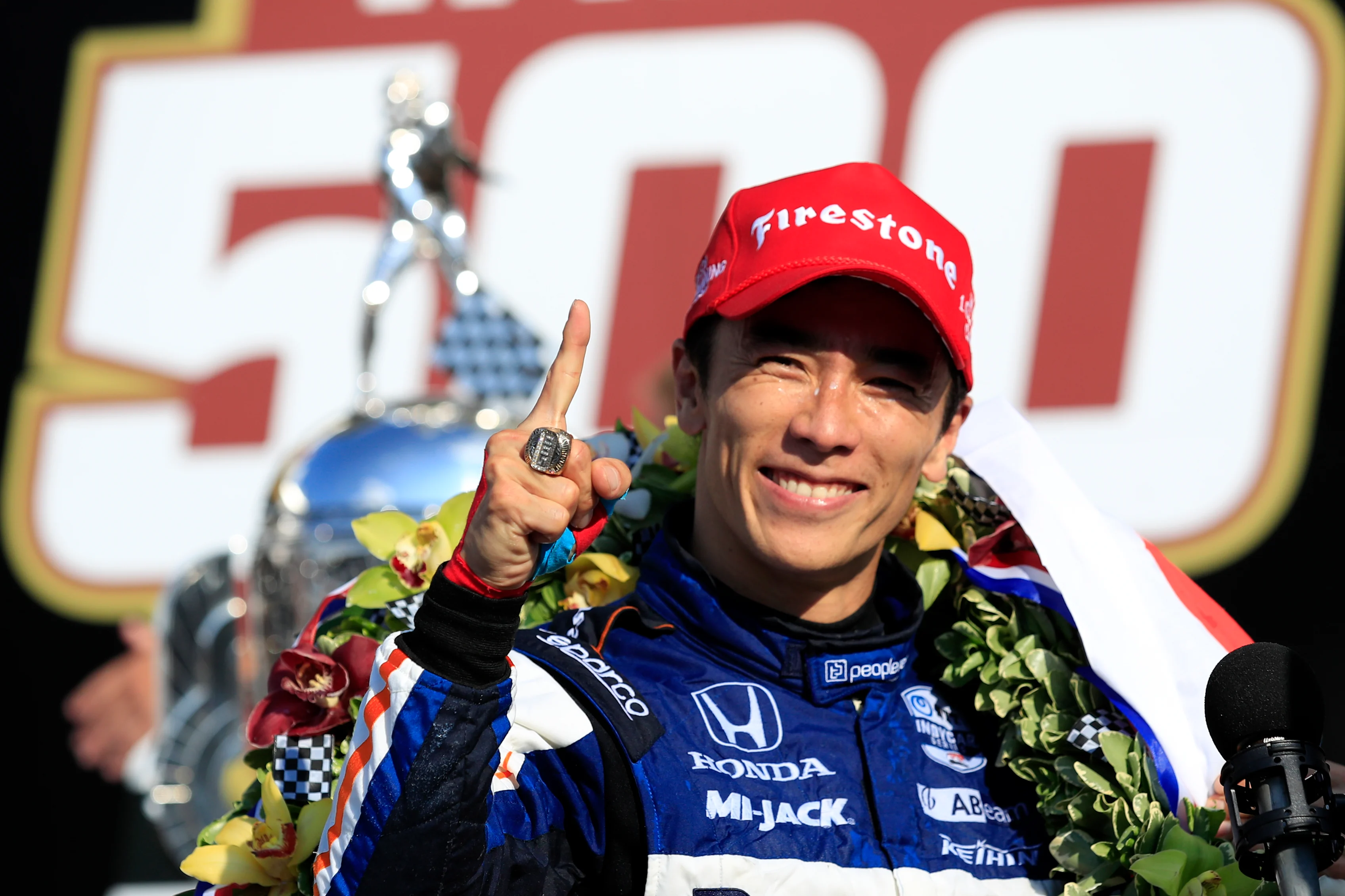 INDIANAPOLIS, INDIANA - AUGUST 23: Takuma Sato, driver of the #30 Panasonic / PeopleReady Rahal
