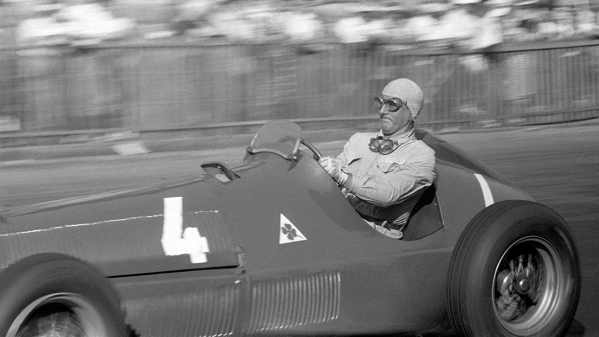 Nino Farina braking hard for a corner in his Alfa 159 during the Grand Prix des Nations at Geneva,