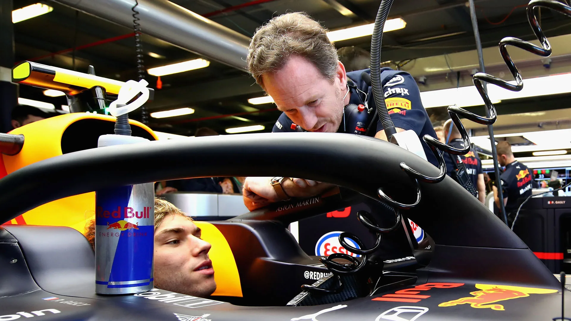 MELBOURNE, AUSTRALIA - MARCH 15: Pierre Gasly of France and Red Bull Racing talks with Red Bull