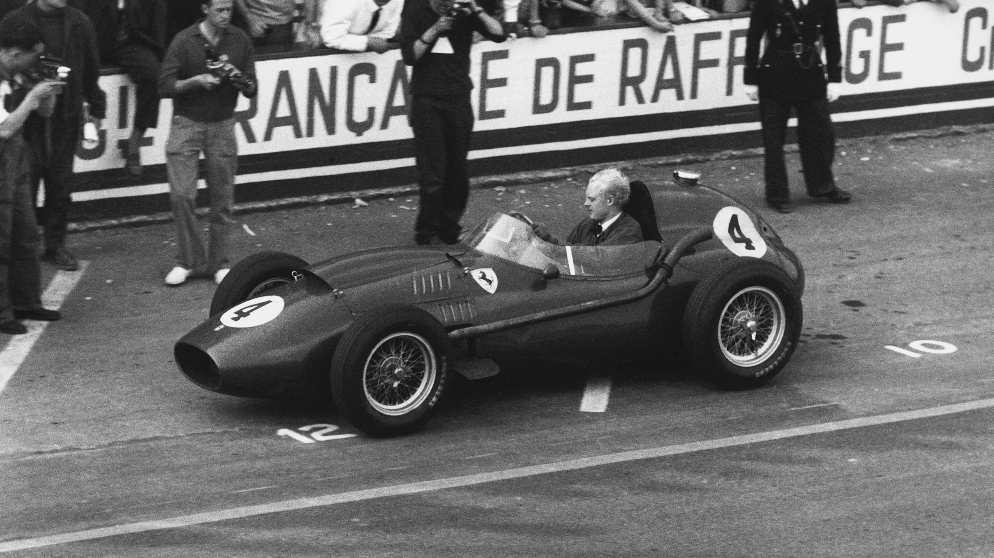 Reims, France. 6 July 1958. Mike Hawthorn, Ferrari Dino 246, 1st position, action. World