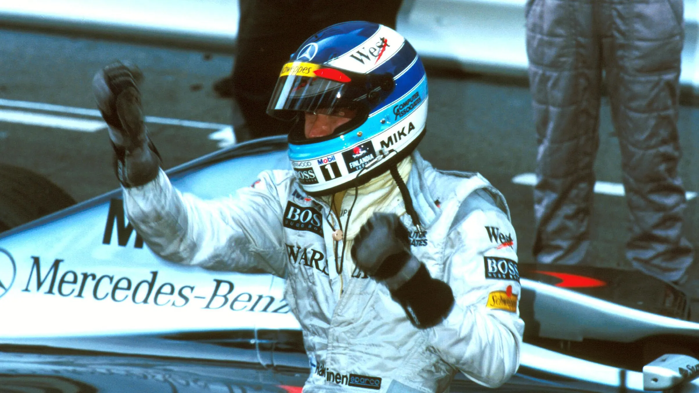 Mika Hakkinen (FIN) Mclaren MP4-13 celebrates his win Formula One World Championship, Rd 6, Monaco