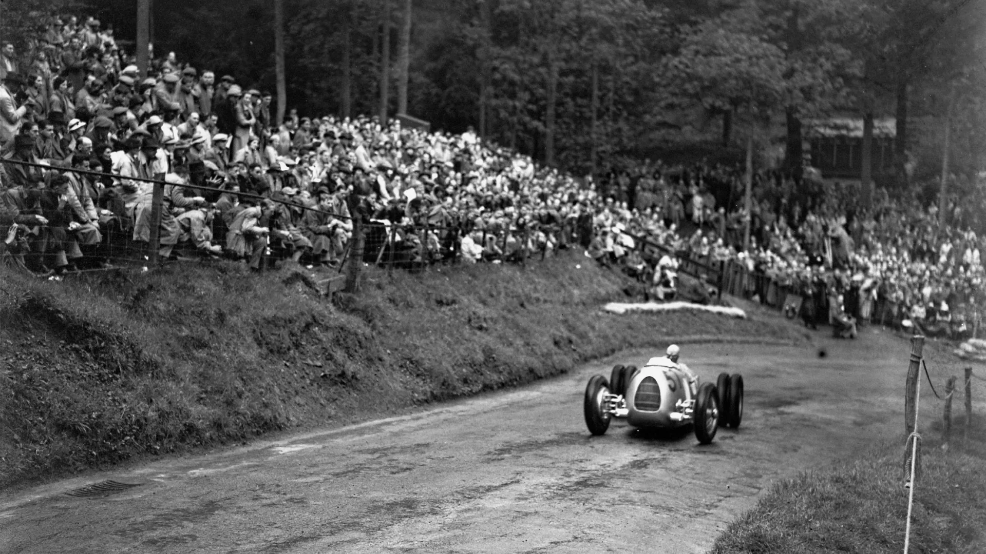 Hans Stuck Snr powers up the Shelsley Walsh hill in his Auto Union Type C in June 1936