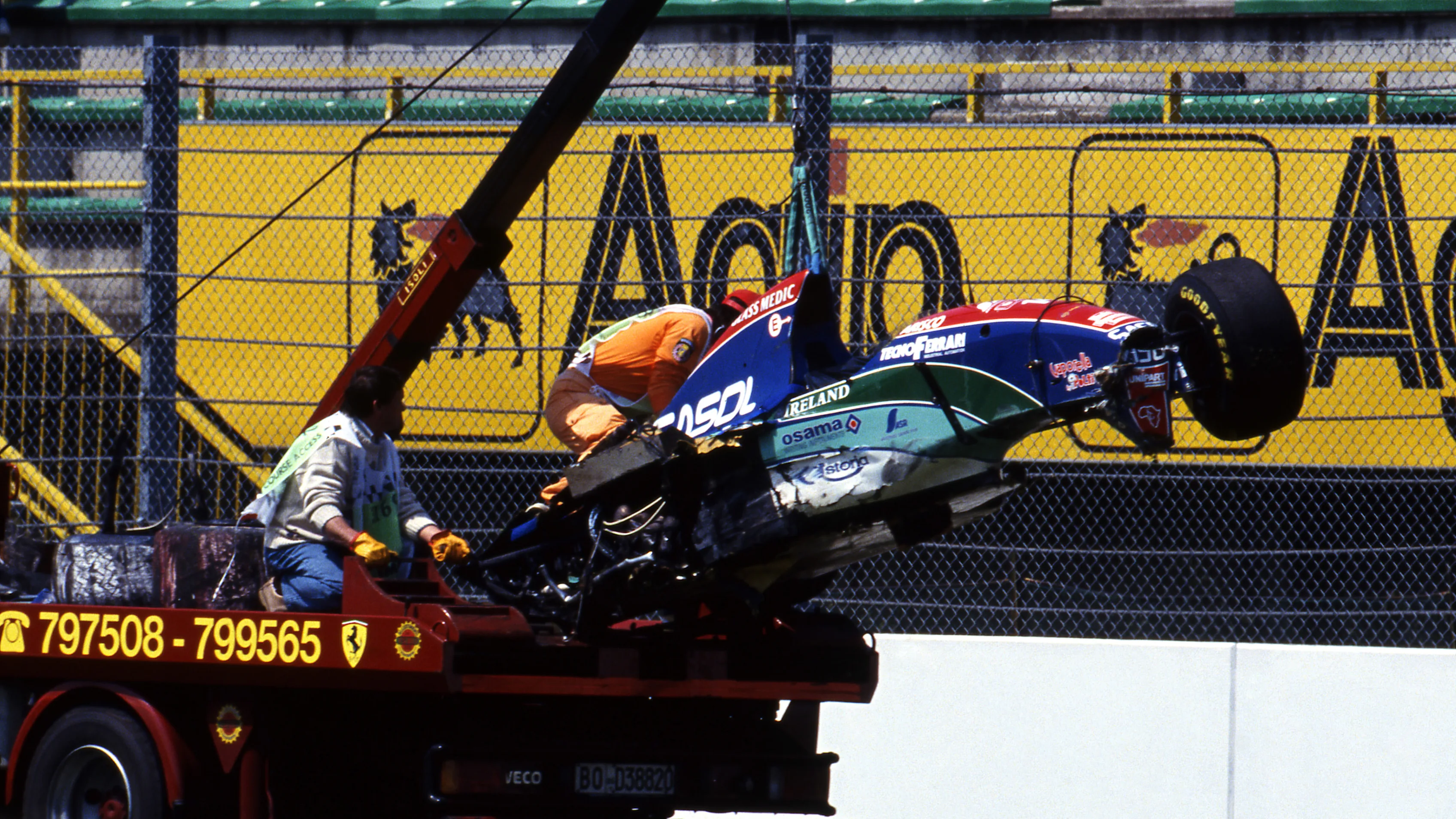 The damaged Jordan 194 of Rubens Barrichello (BRA) who crashed at Variante Bassa at 140mph during