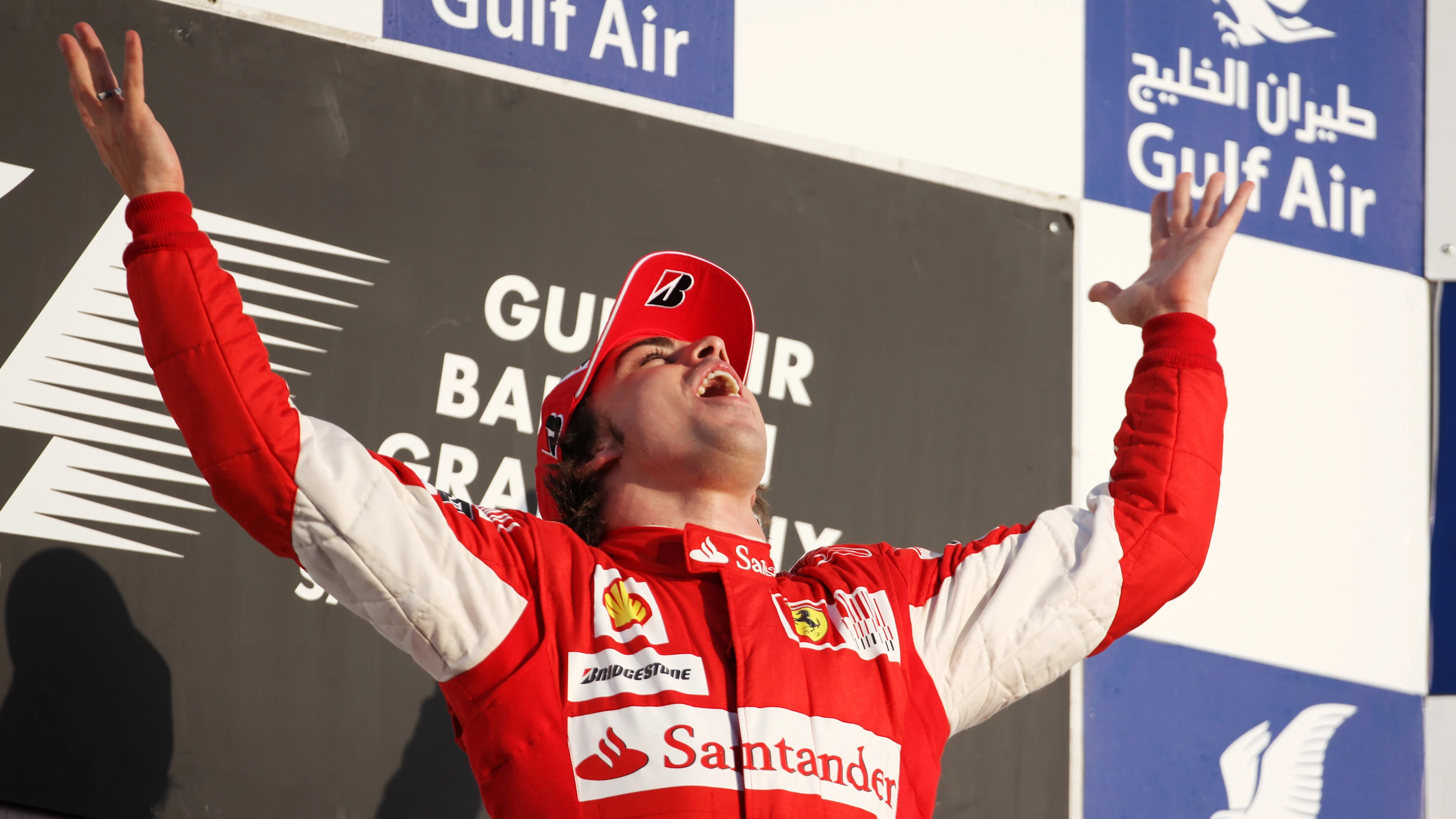 Race winner Fernando Alonso (ESP) Ferrari on the podium.  Formula One World Championship, Rd 1,