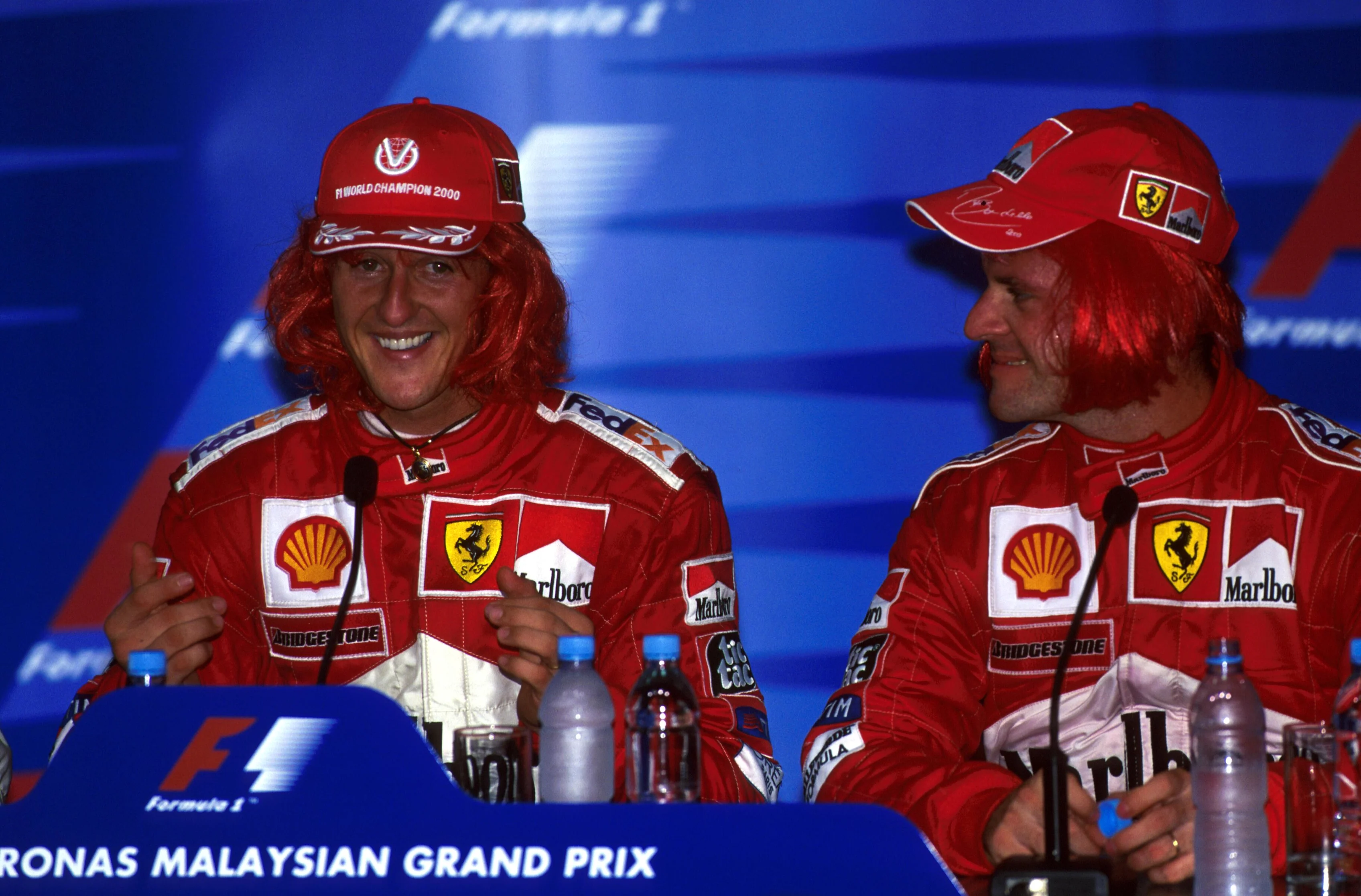 Winner, Michael Schumacher(GER)Ferrari F1-2000 and team mate Rubens Barrichello(BRA) right both