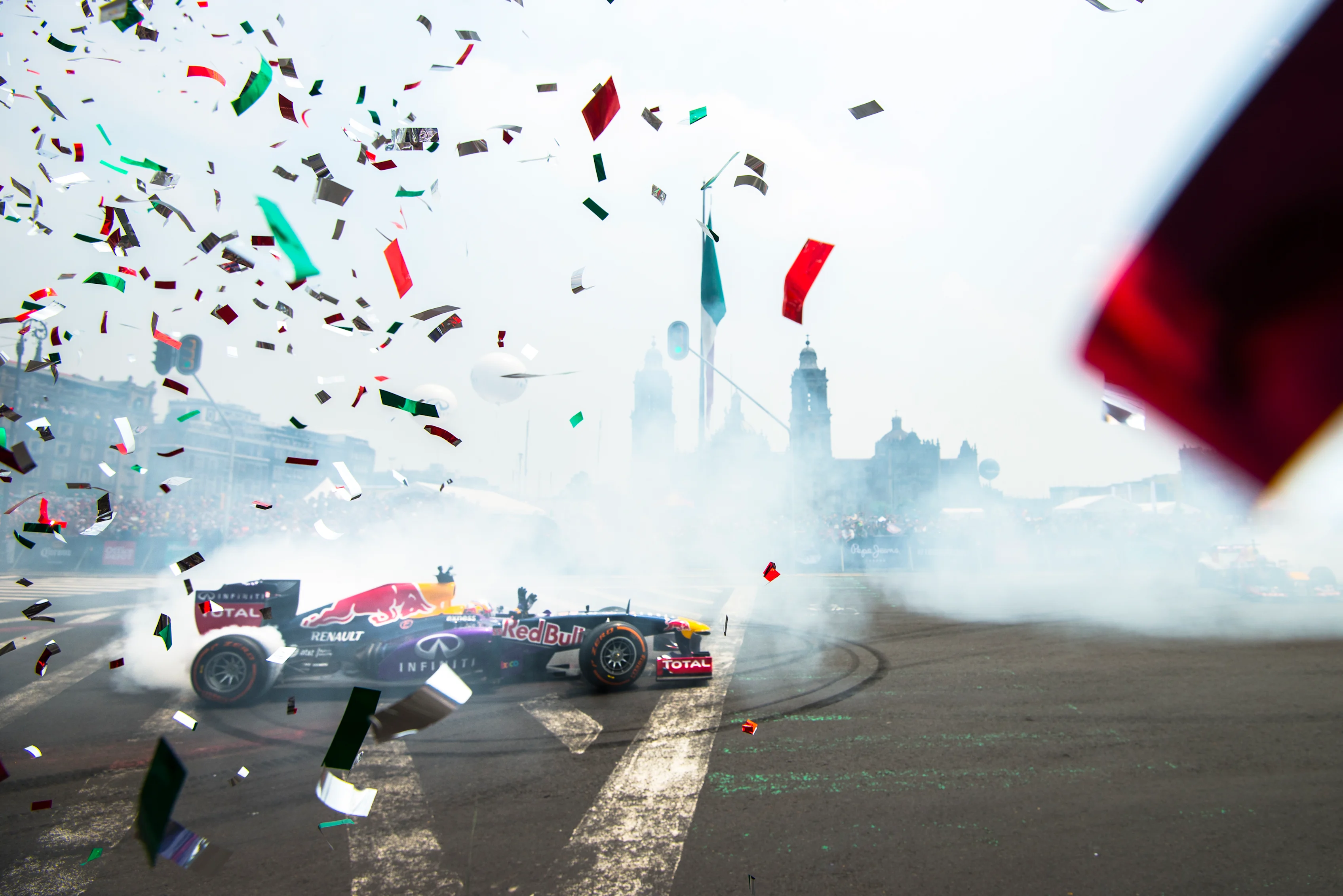 Carlos Sainz performs during Infiniti Red Bull Racing F1 Show Run at the Zocalo Plaza in Mexico City on June 27th, 2015 © Marcos Ferro/Red Bull Content Pool