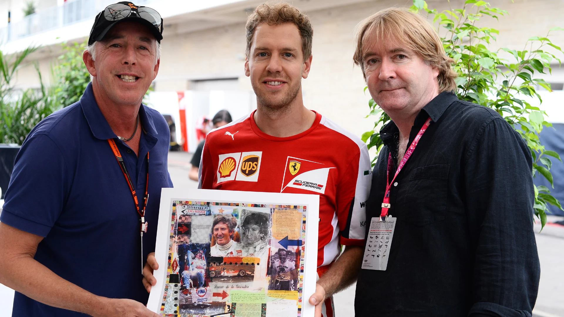 Keith Sutton (GBR) Sutton Images CEO, Sebastian Vettel (GER) Ferrari and Mark Dickens (GBR) Artist with the Jochen Rindt World Champions in Art depiction at Formula One World Championship, Rd16, United States  Grand Prix, Preparations, Austin, Texas, USA, Thursday 22 October 2015. © Sutton Motorsport Images