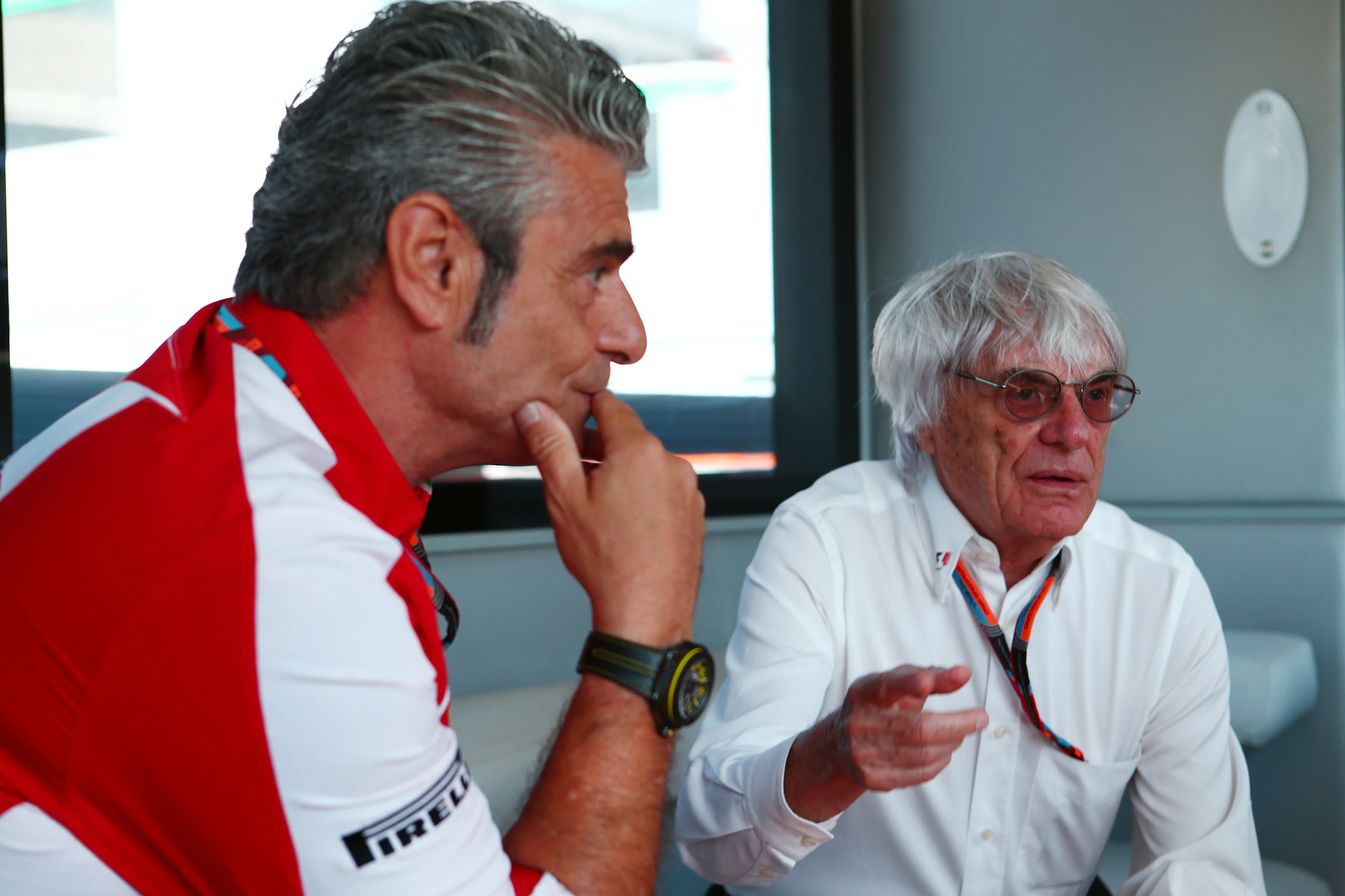 Formula One group CEO Bernie Ecclestone in conversation with Ferrari team principal Maurizio