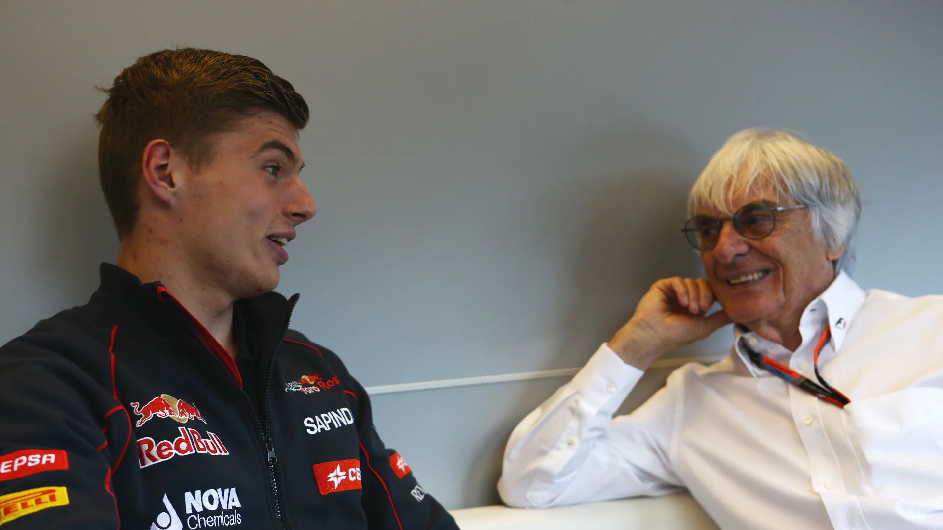 Formula One group CEO Bernie Ecclestone in conversation with Toro Rosso's Max Verstappen, Austria,
