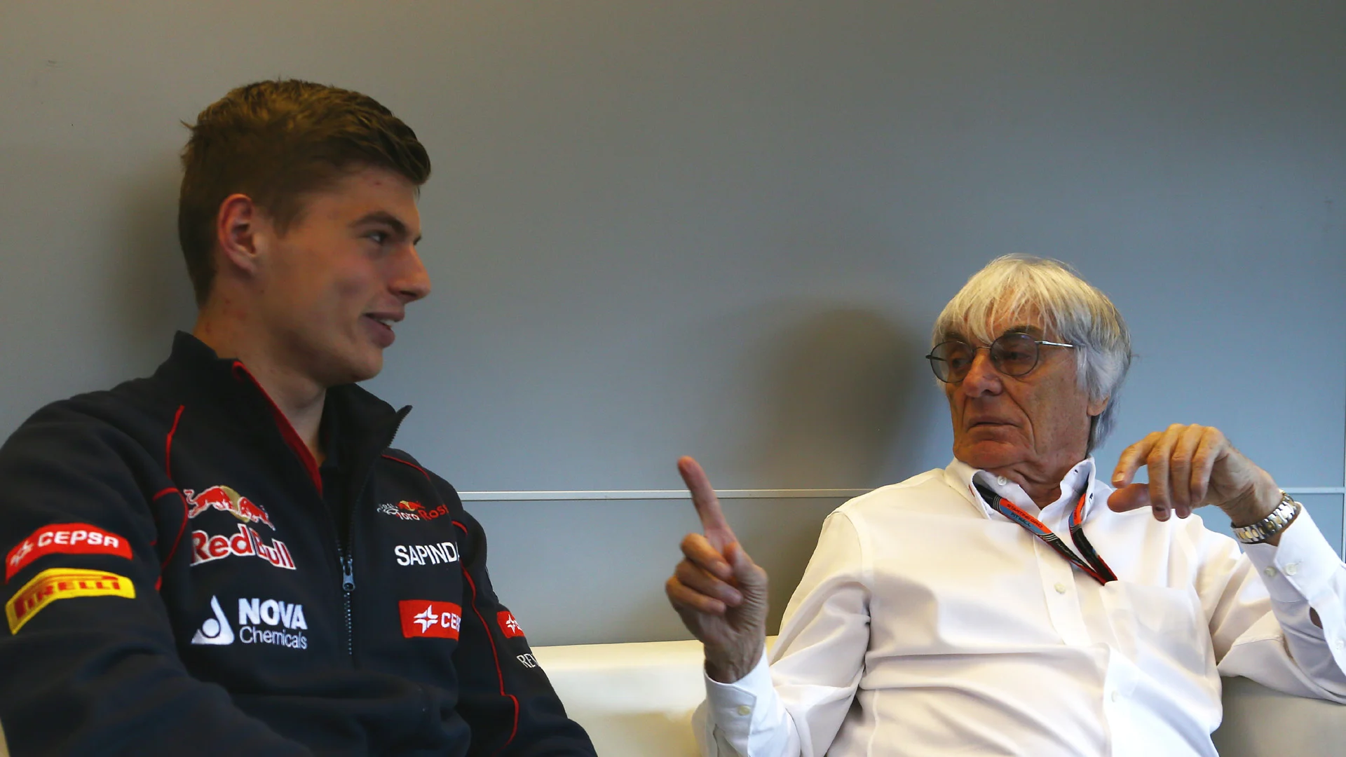 Formula One group CEO Bernie Ecclestone in conversation with Toro Rosso's Max Verstappen, Austria,