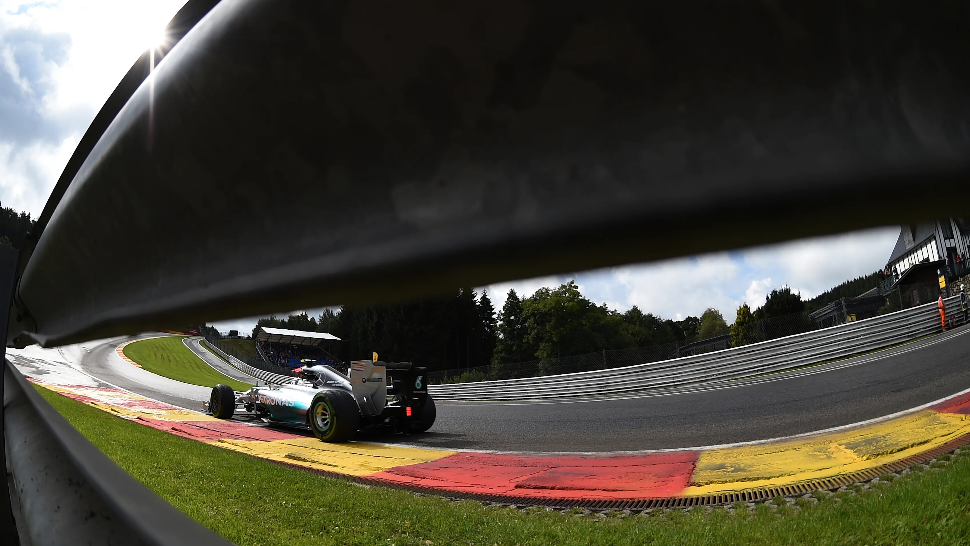 Nico Rosberg (Mercedes AMG F1 W05) as seen through the Eau Rouge Armco. 2014 Belgian Grand Prix. © Sutton Motorsport Images