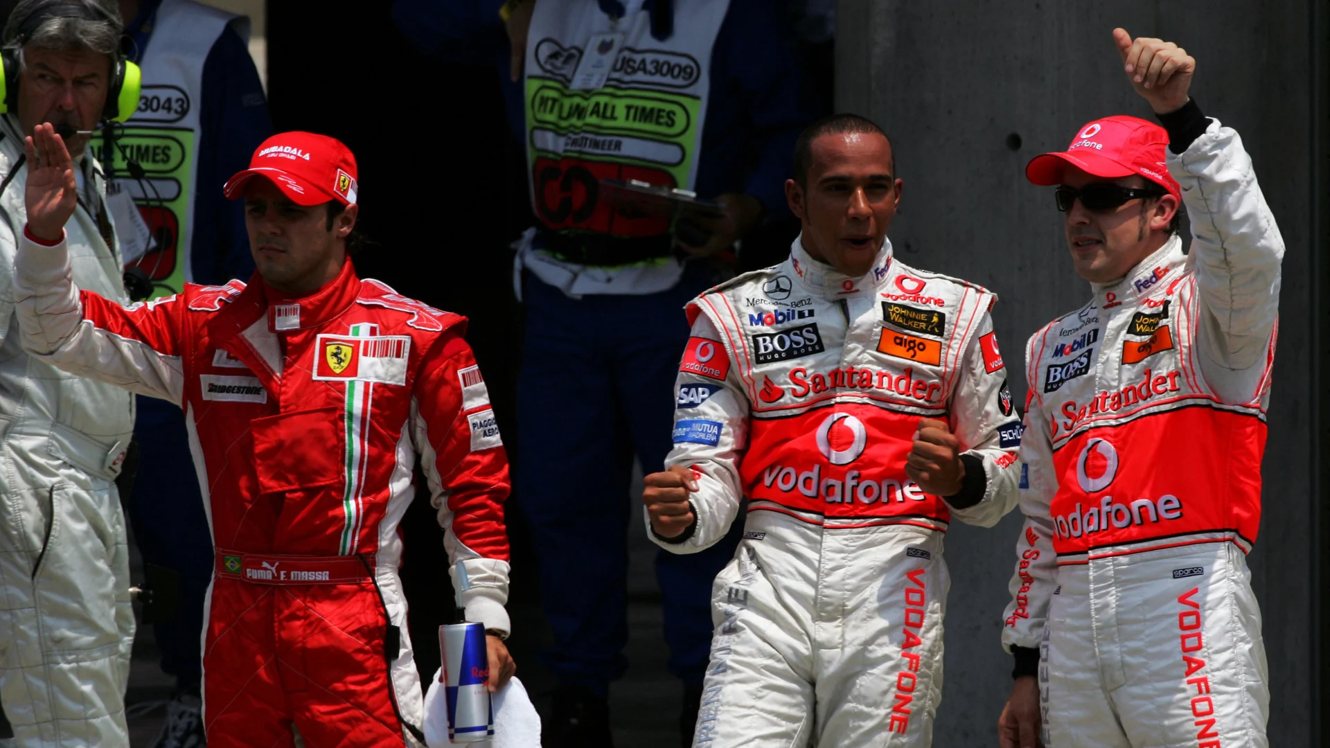 (L to R): Felipe Massa (BRA) Ferrari; pole sitter Lewis Hamilton (GBR) McLaren and Fernando Alonso