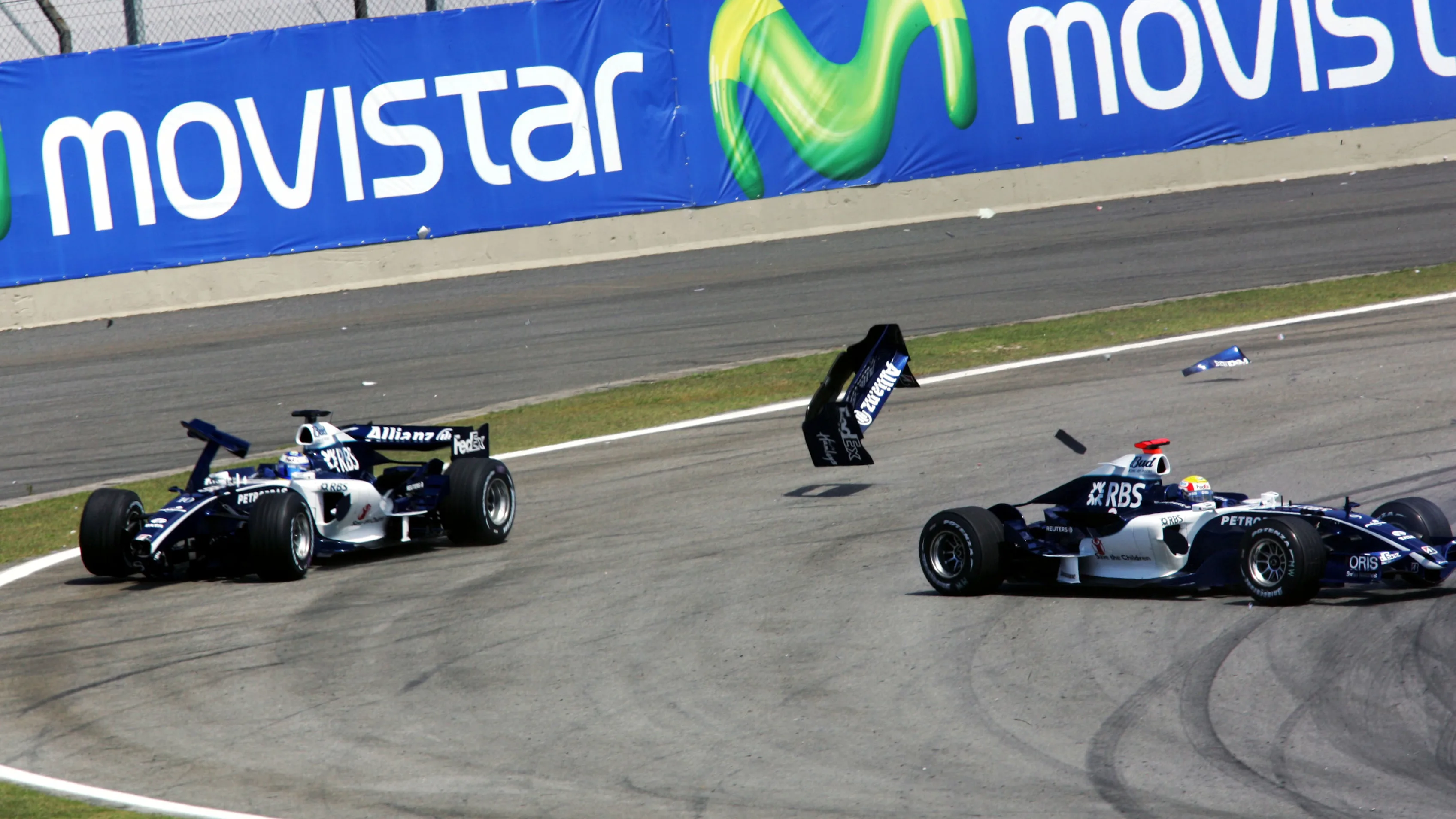Nico Rosberg (GER) Williams FW28 crashes into Mark Webber (AUS) Williams FW28. Formula One World
