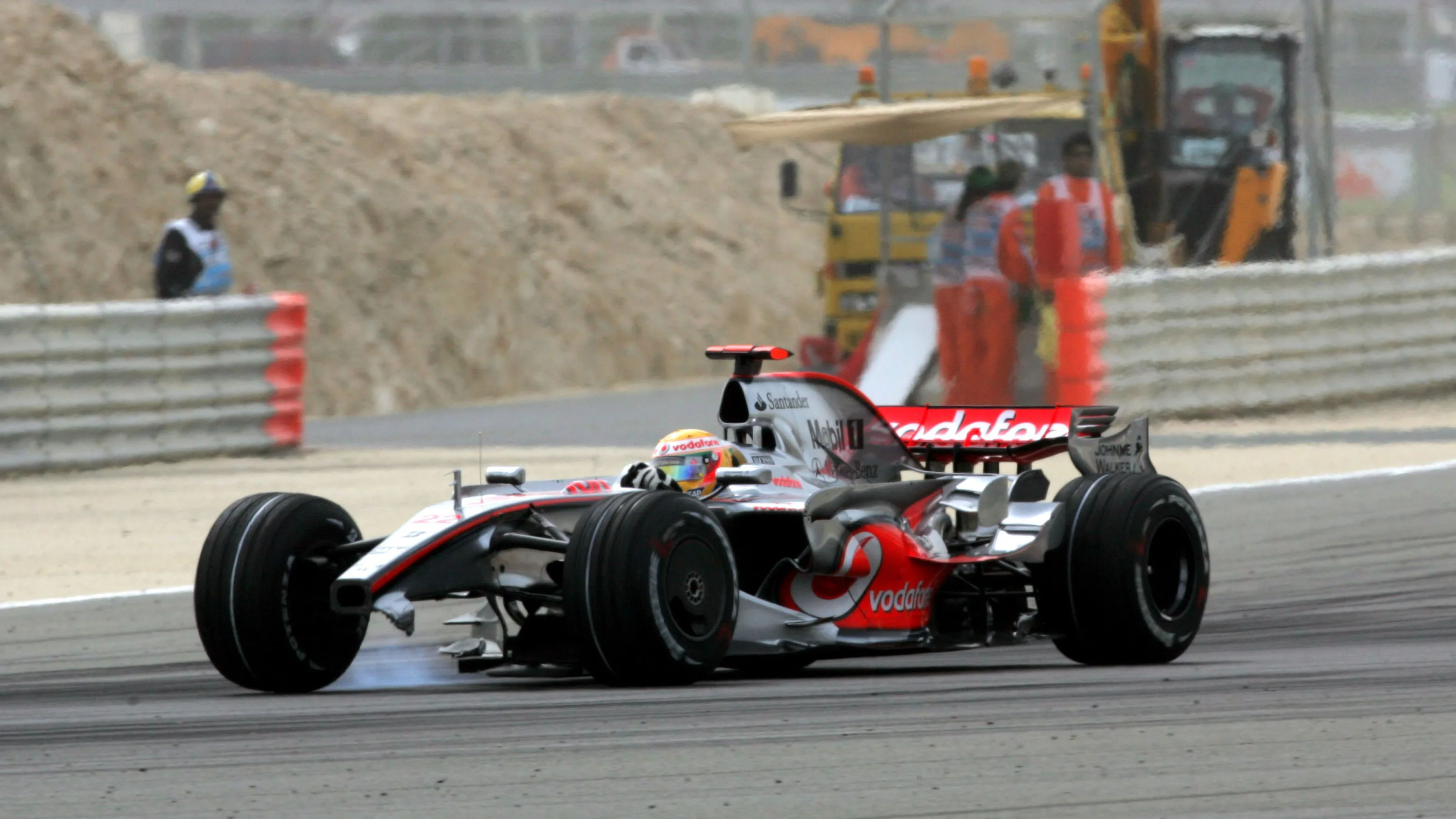 Lewis Hamilton (GBR) McLaren Mercedes MP4/23 with front wing damage. Formula One World