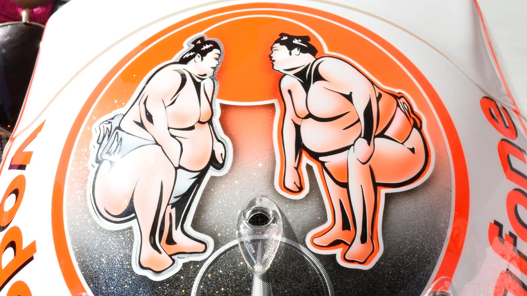 The helmet of Jenson Button (GBR) McLaren with customized Sumo wrestlers design. Formula One World