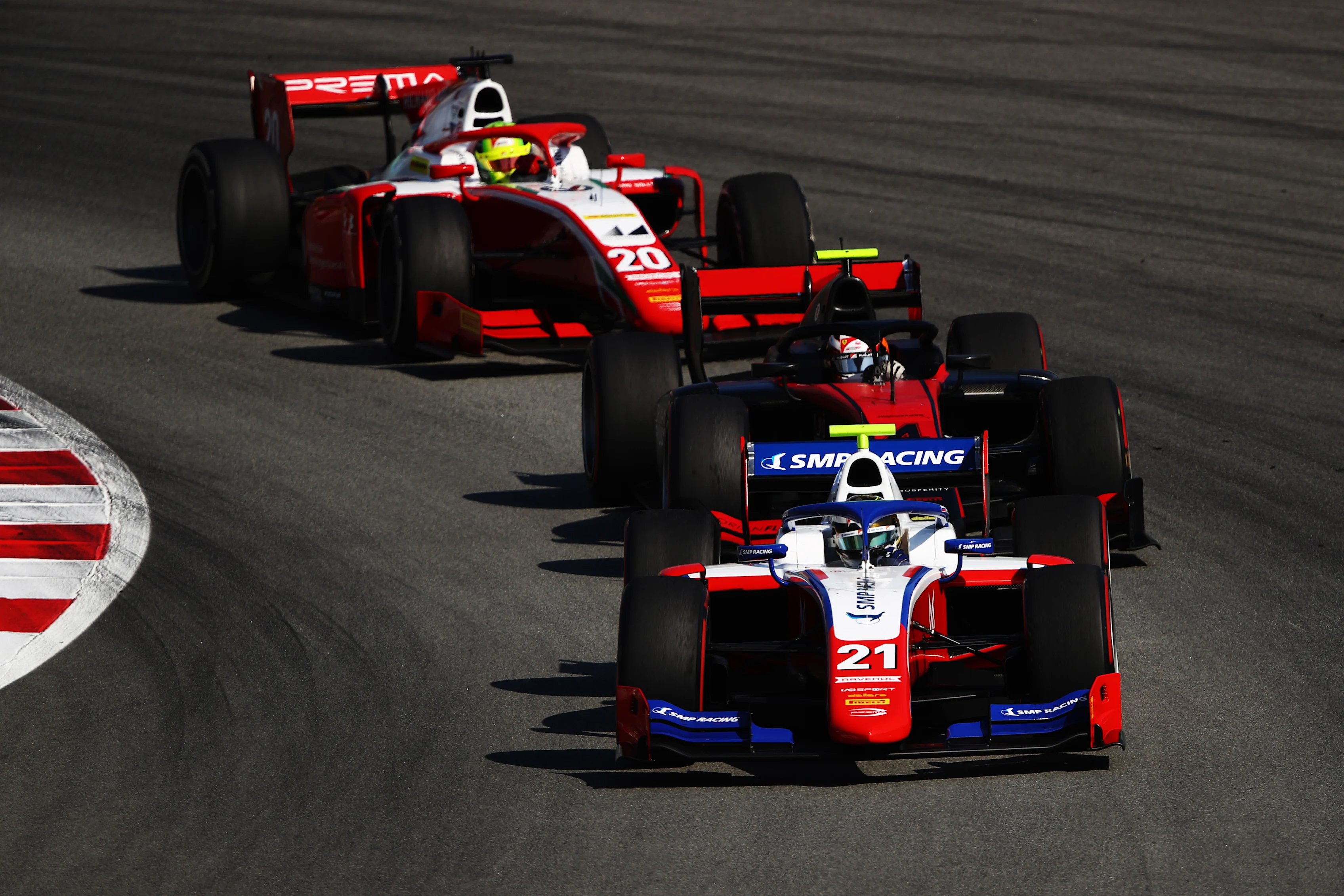 BARCELONA, SPAIN - AUGUST 15: Robert Shwartzman of Russia and Prema Racing (21) leads Callum Ilott