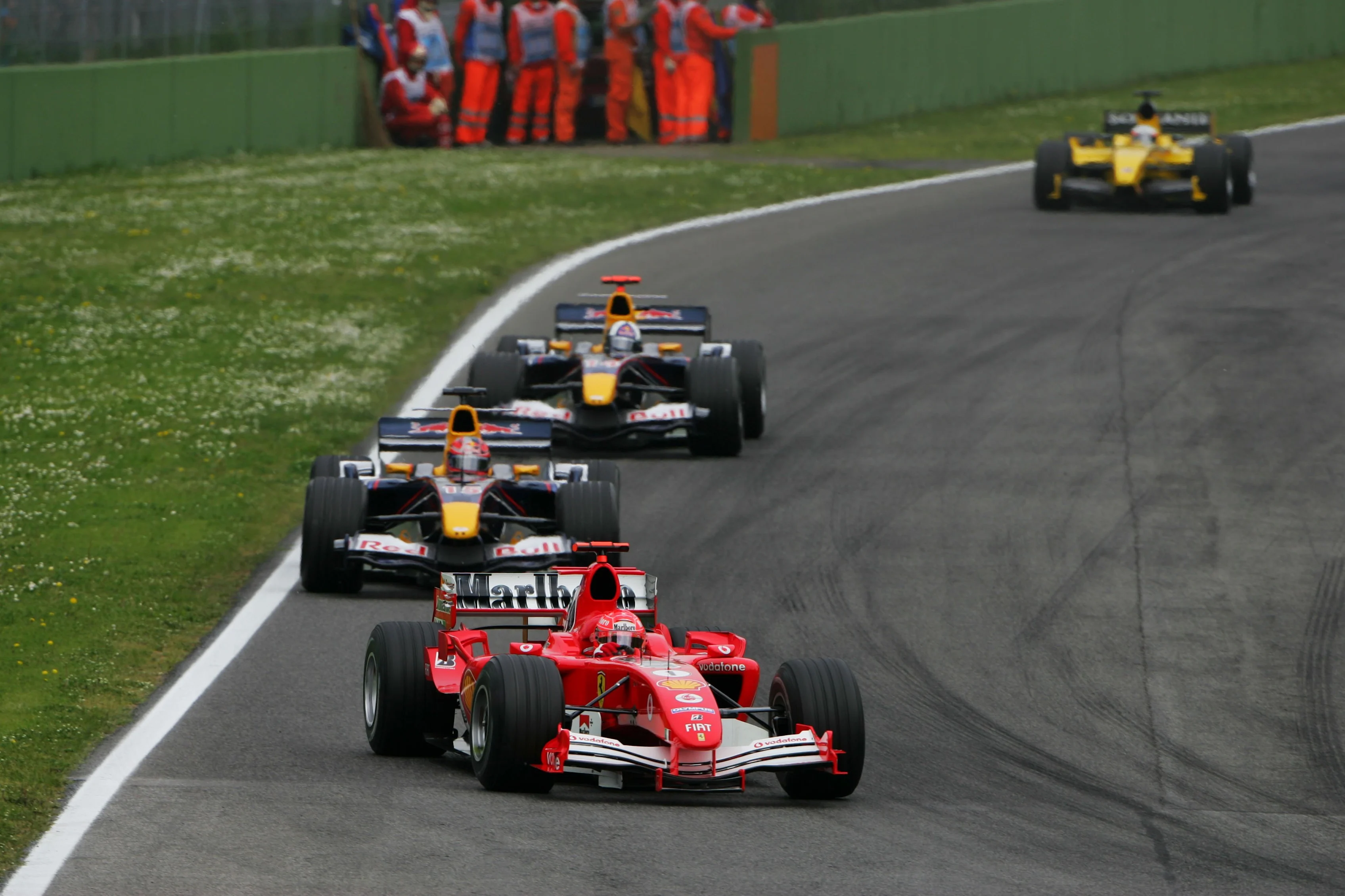 Michael Schumacher (GER) Ferrari F2005 leads Vitantonio Liuzzi (ITA) Red Bull Racing 
Formula One